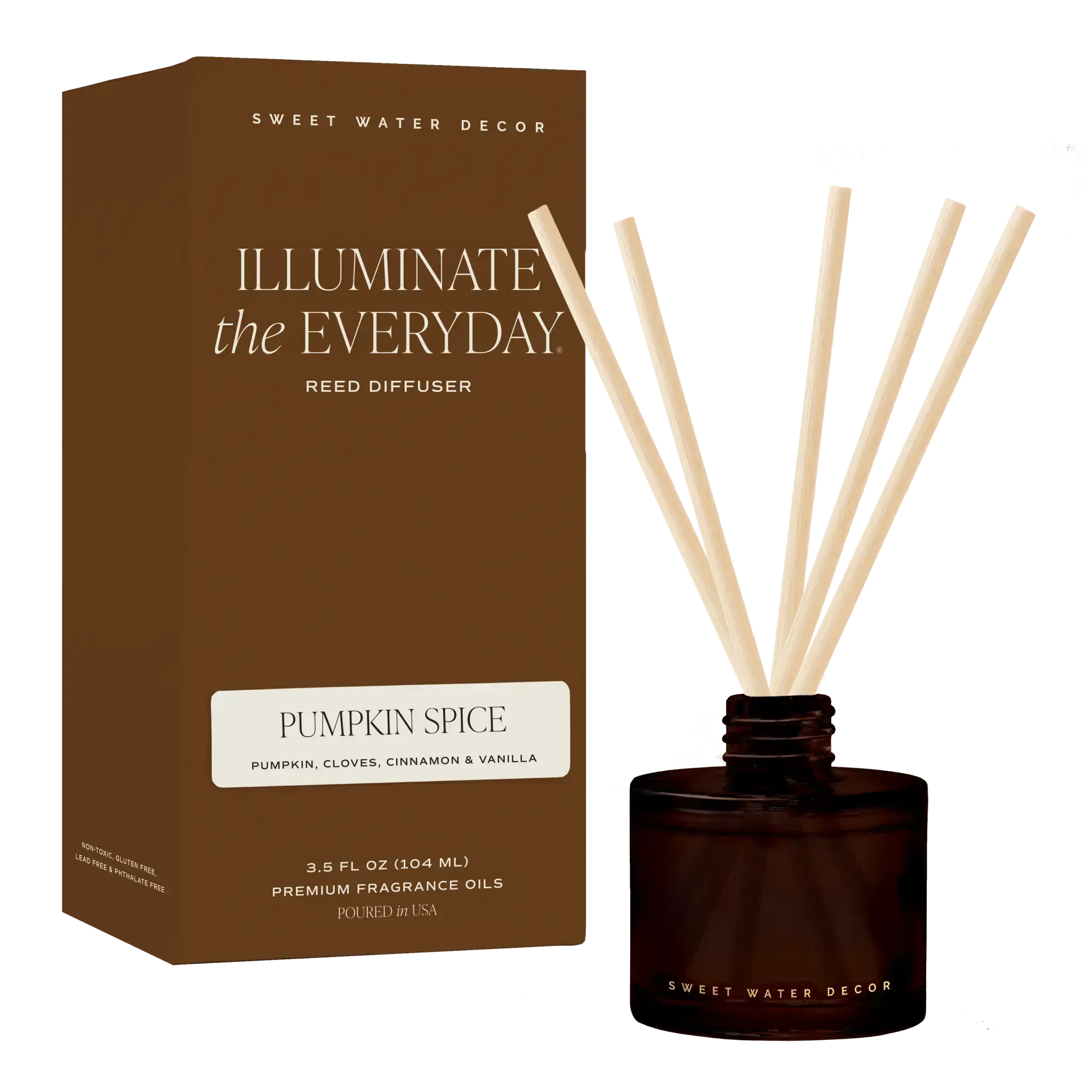 Sweet Water Decor 'Illuminate the Everyday' reed diffuser set, featuring a brown cardboard box and a dark amber glass bottle with cream-colored reeds, on a solid dark green background.