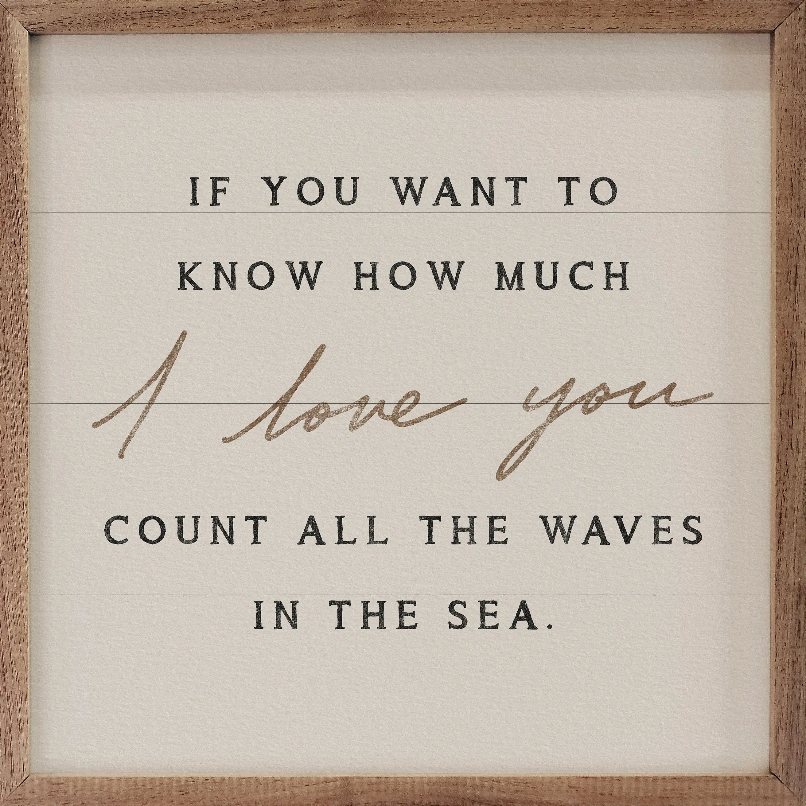 A square framed sign with a rustic wood border and a cream background. The text reads, 'IF YOU WANT TO KNOW HOW MUCH I love you COUNT ALL THE WAVES IN THE SEA.