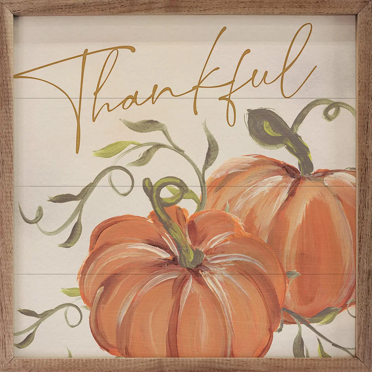 Decorative sign with pumpkins and the word 'Thankful' in a wooden frame.