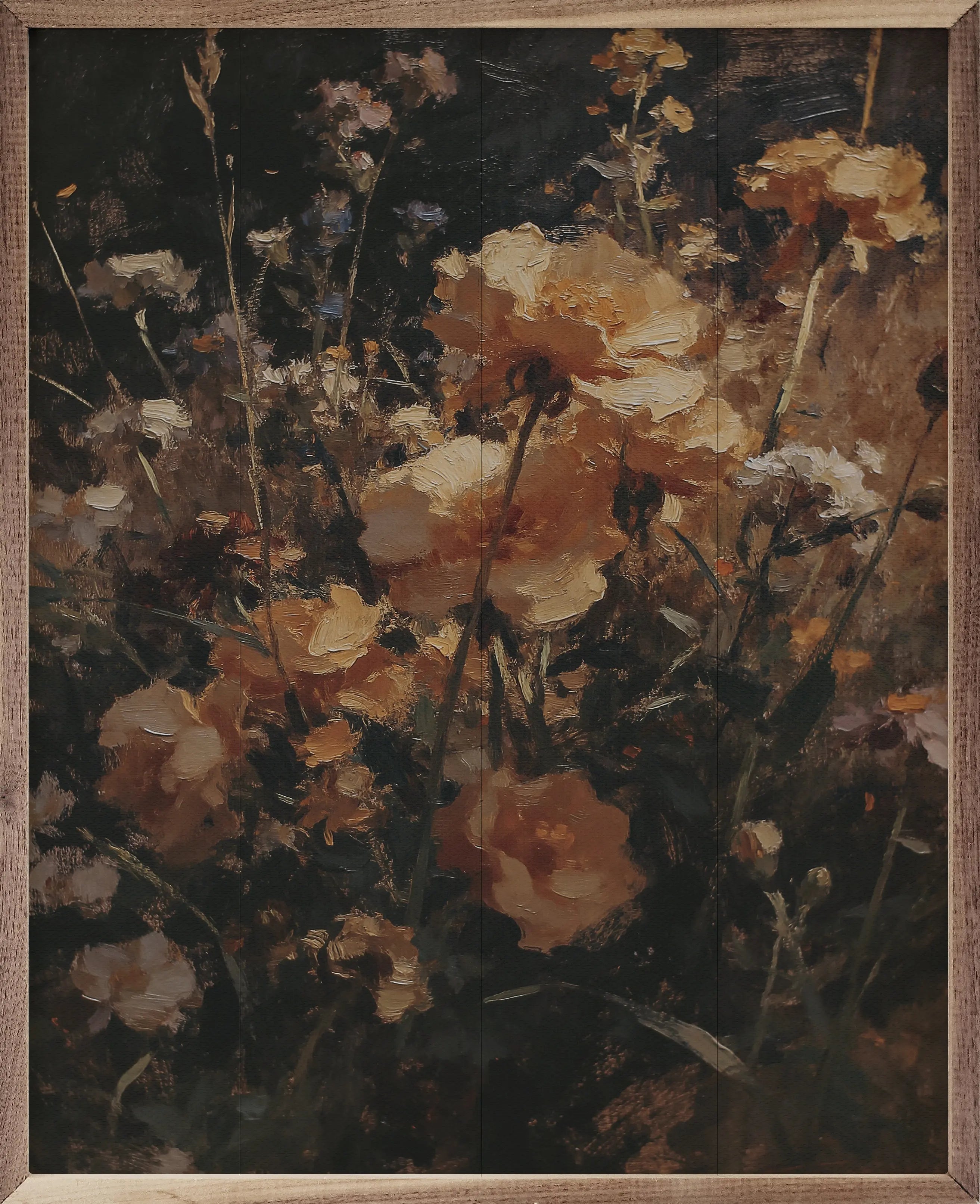 Framed artwork of a floral arrangement with warm tones.