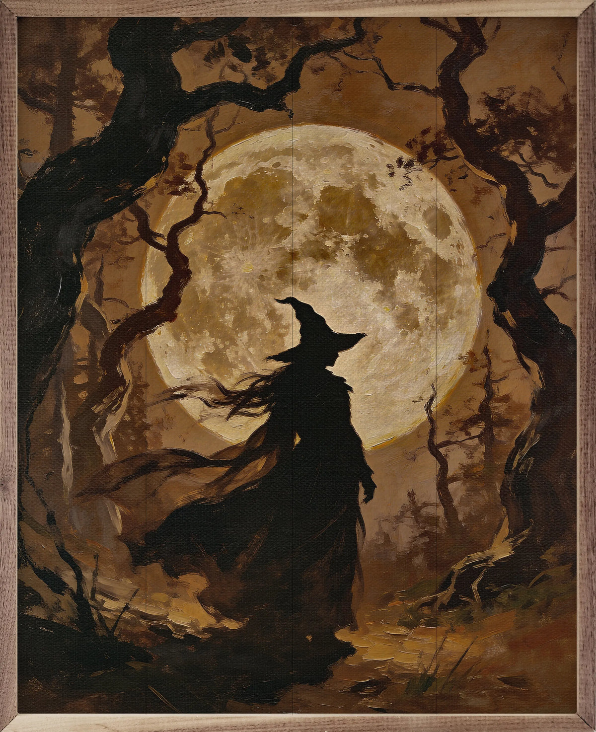 A framed art print depicting a witch's silhouette wearing a pointed hat, standing in a spooky forest with twisted trees and a large full moon glowing behind them.