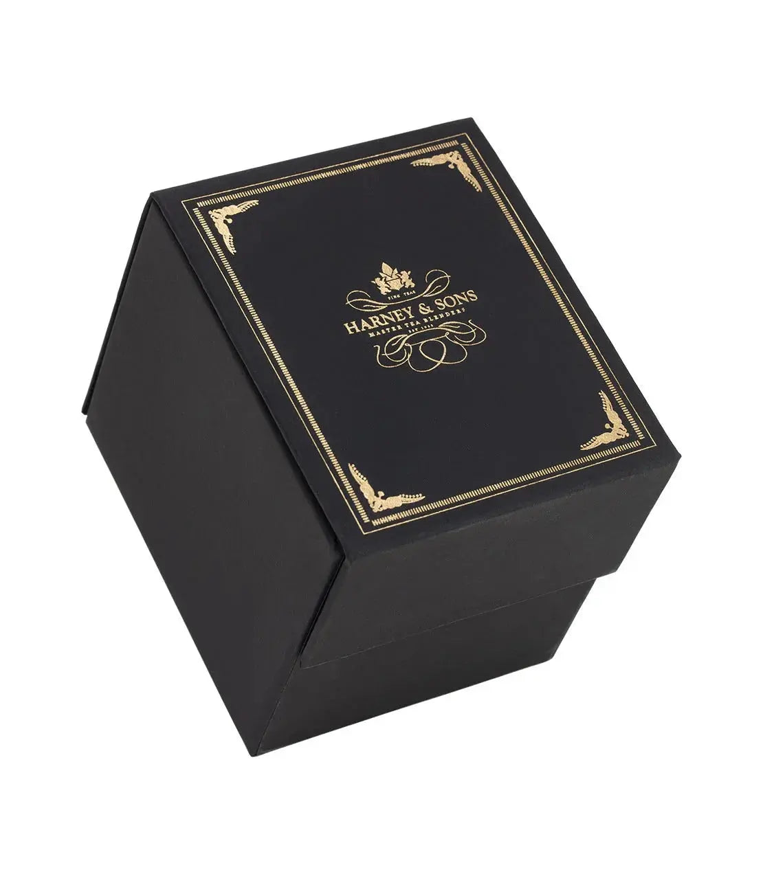Elegant black gift box with gold Harney & Sons tea branding, perfect for cozy home decor or thoughtful gifts.