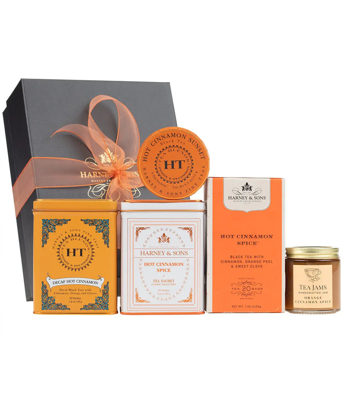 Hot Cinnamon Spice tea gift set with tins, sachets, and orange cinnamon jam, perfect for cozy home decor