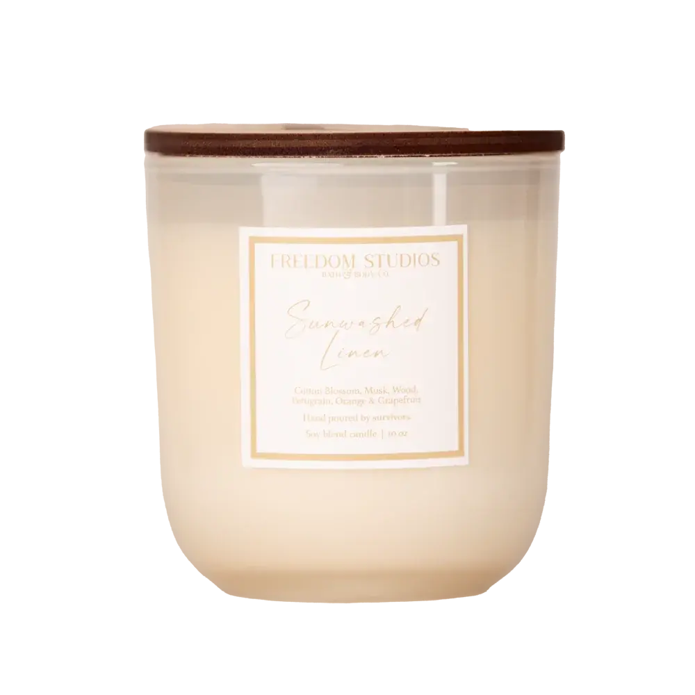 Sunwashed Linen soy candle in frosted glass jar with wooden lid, cozy home decor essential
