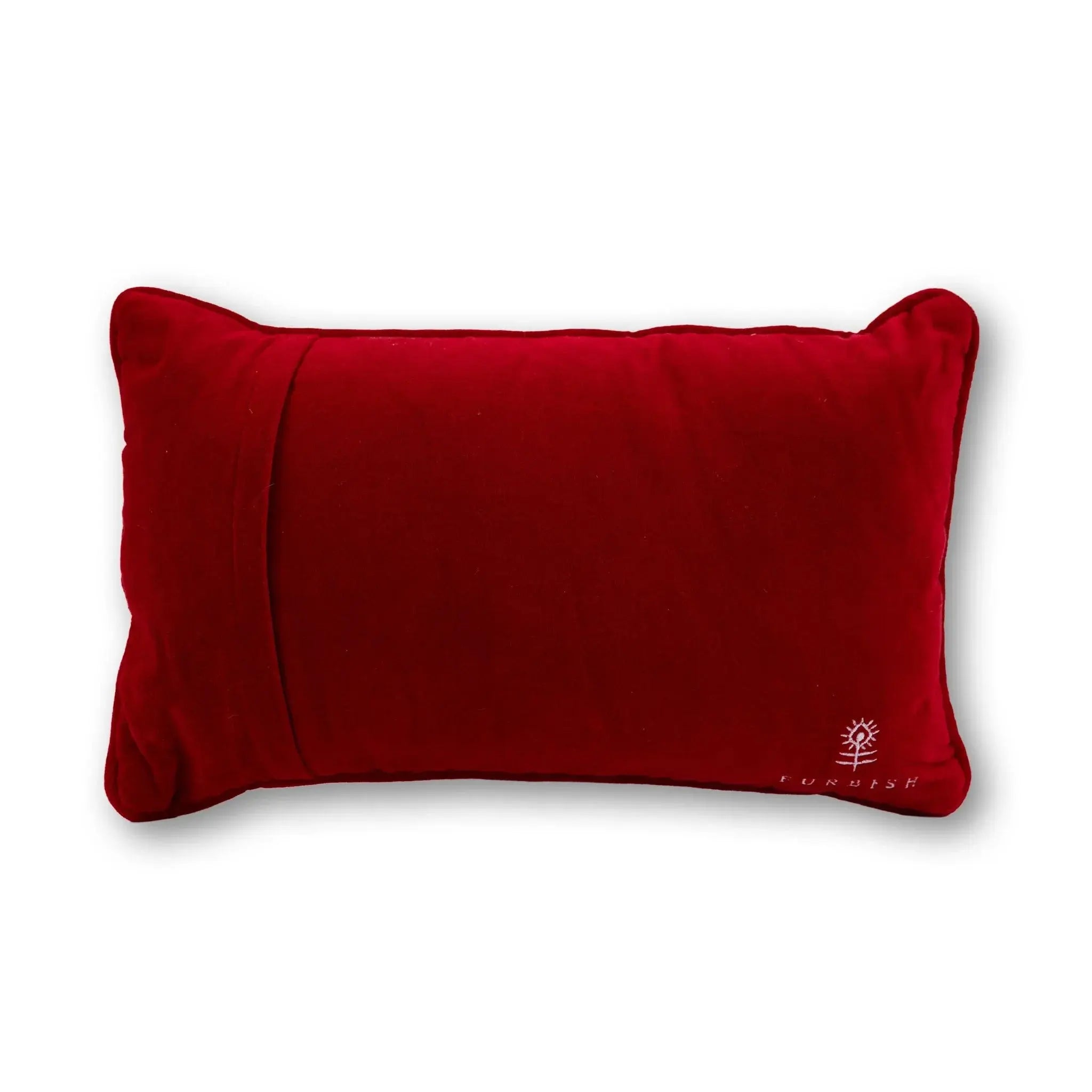 Red pillow with a brand logo on a white background