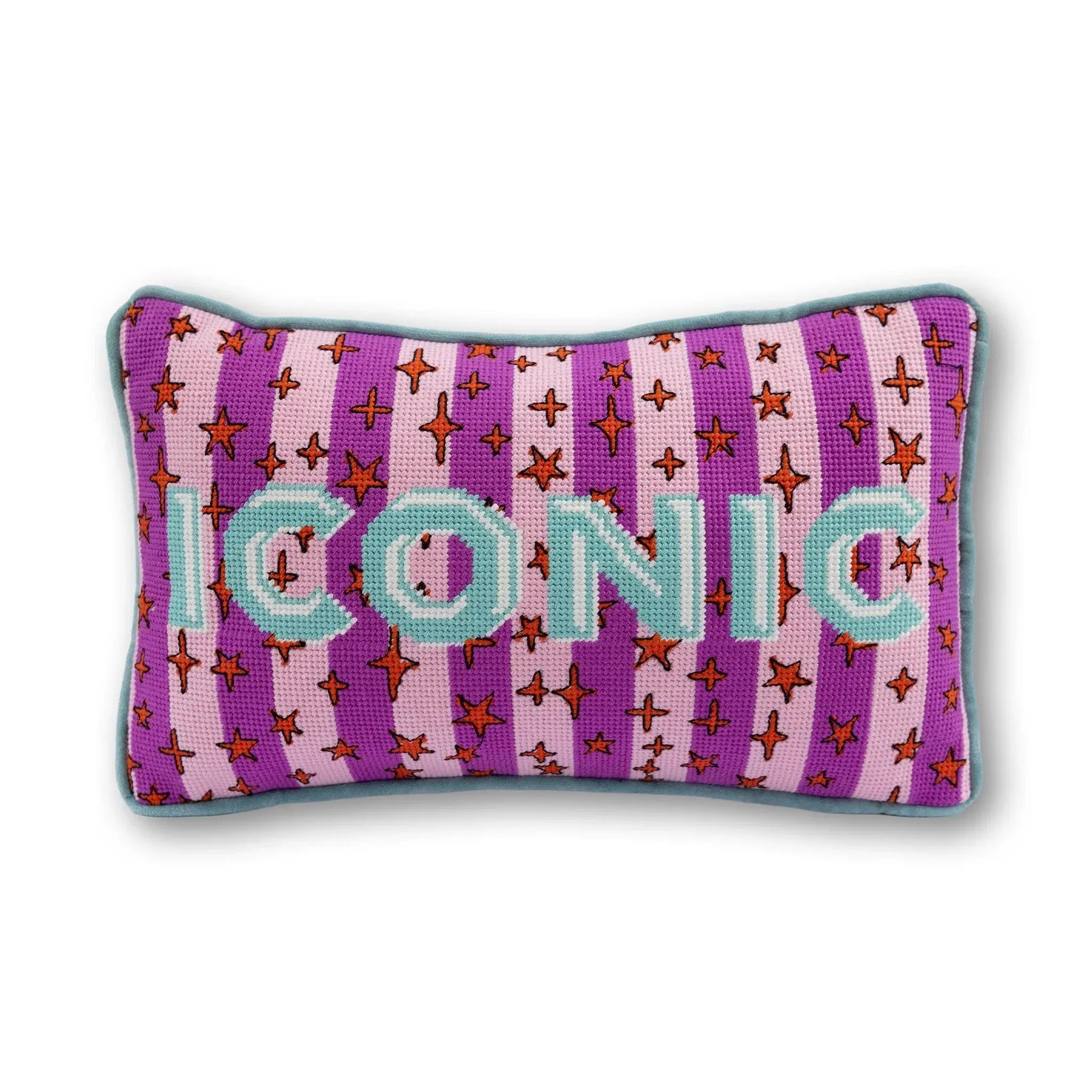 Decorative pillow with 'ICONIC' text on a white background