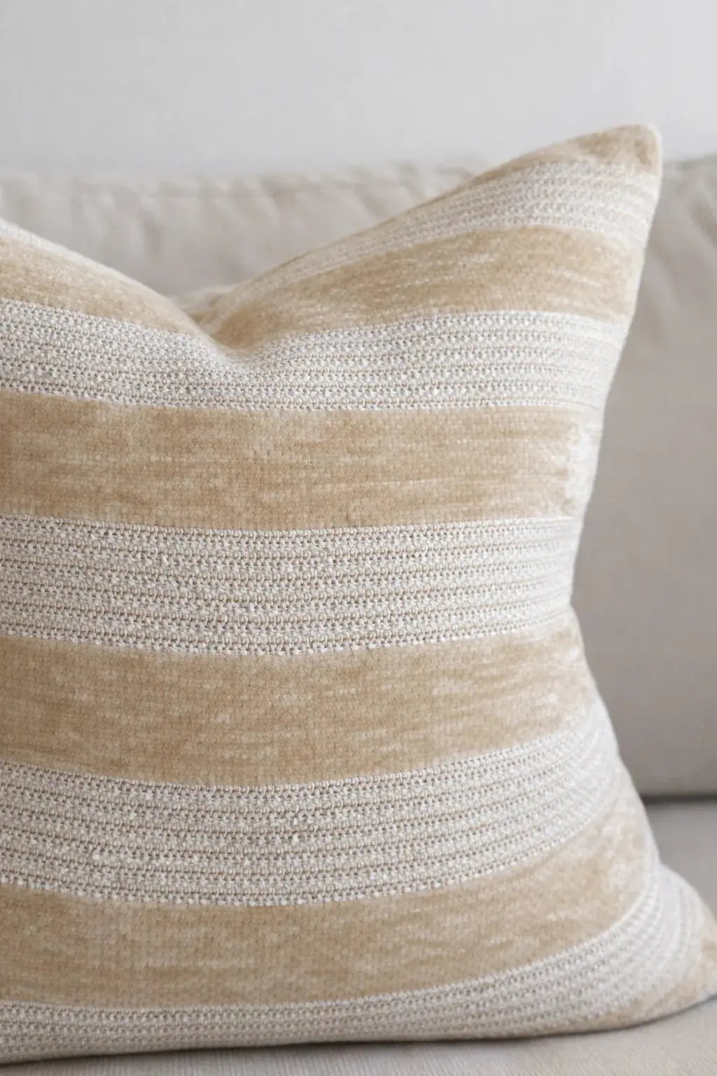 Beige and cream striped throw pillow with textured weave, cozy farmhouse decor for living room sofa