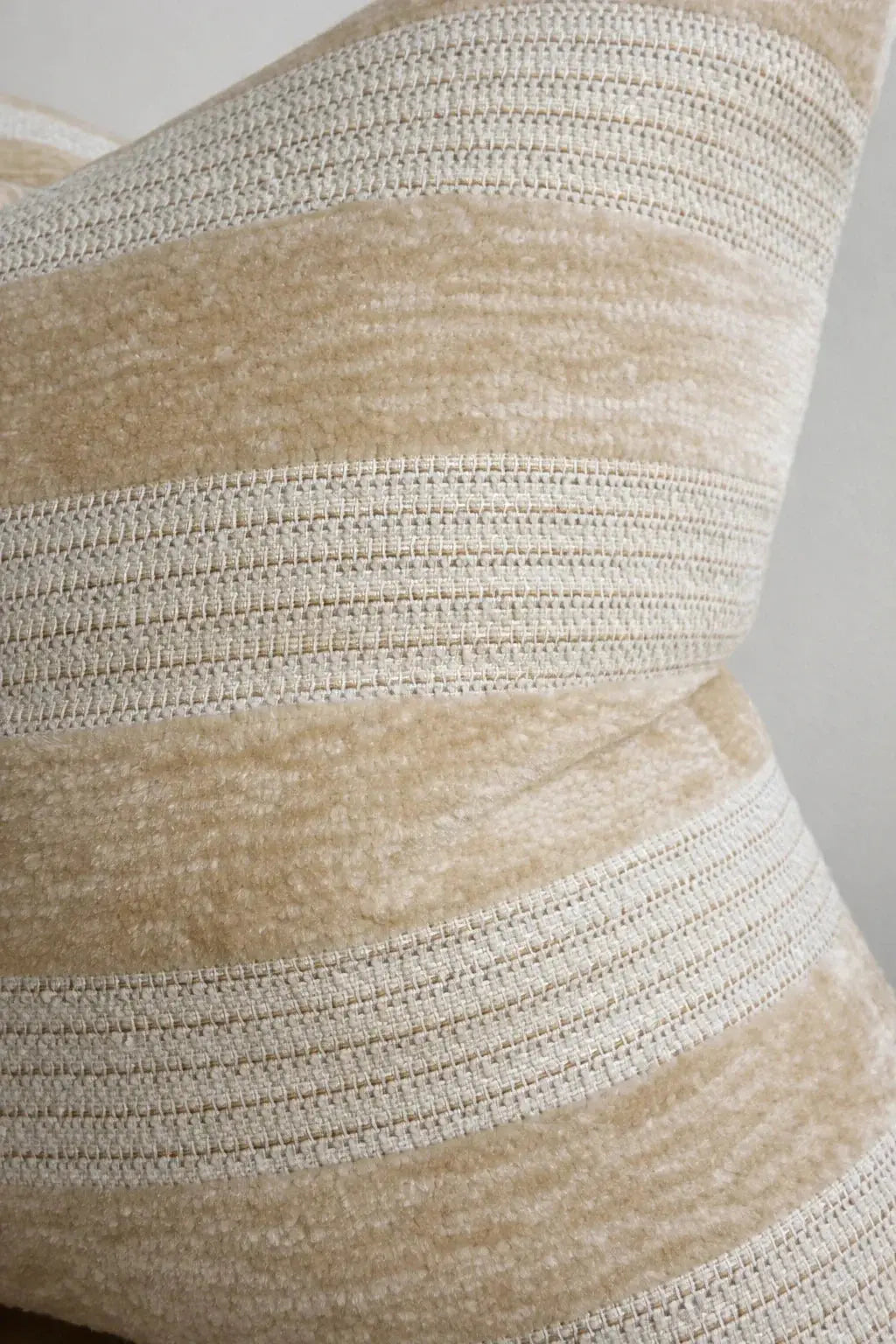 Beige and cream striped throw pillow with textured weave, cozy farmhouse decor accent