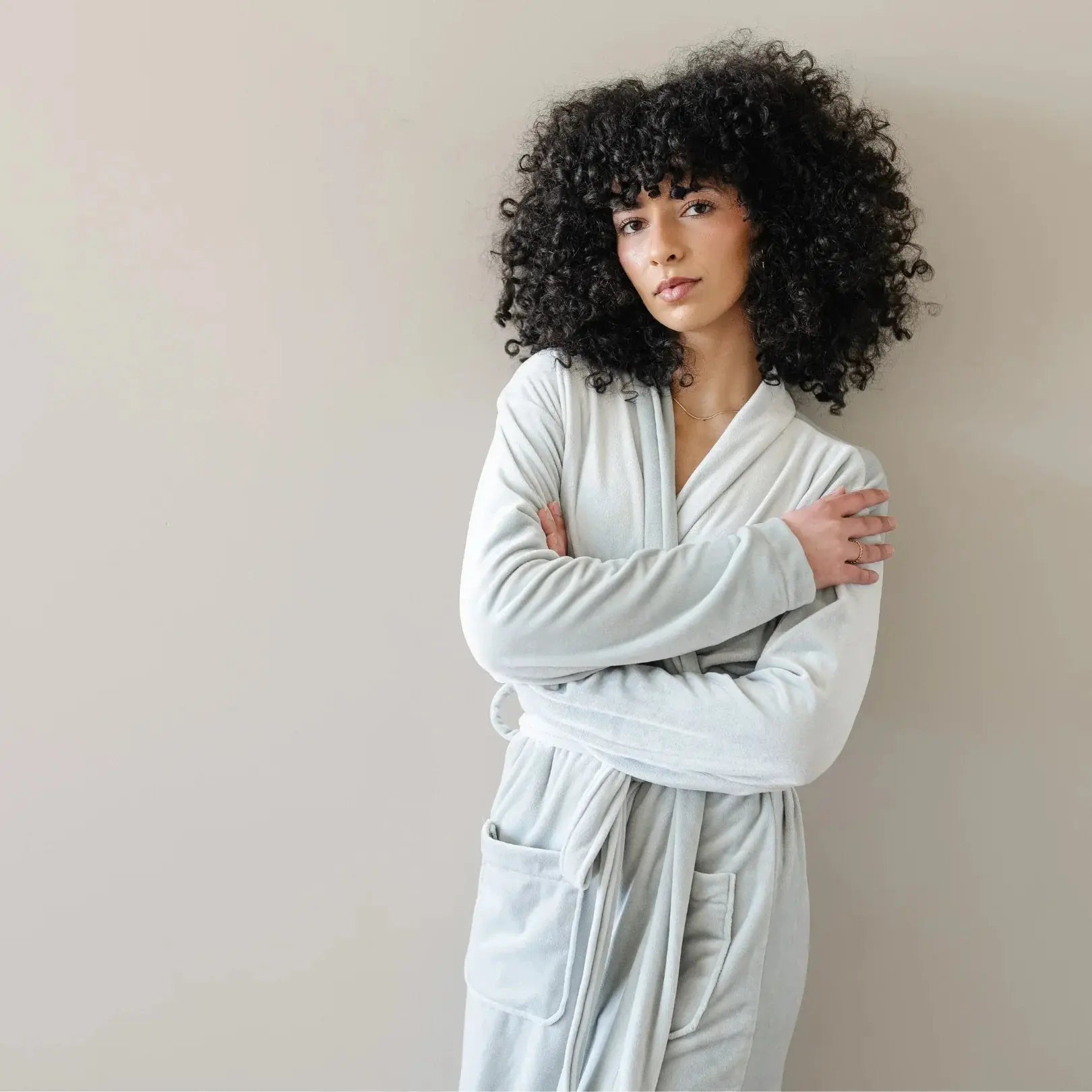 Cozy light blue plush robe for women, perfect for farmhouse or cottage style home relaxation and bath essentials