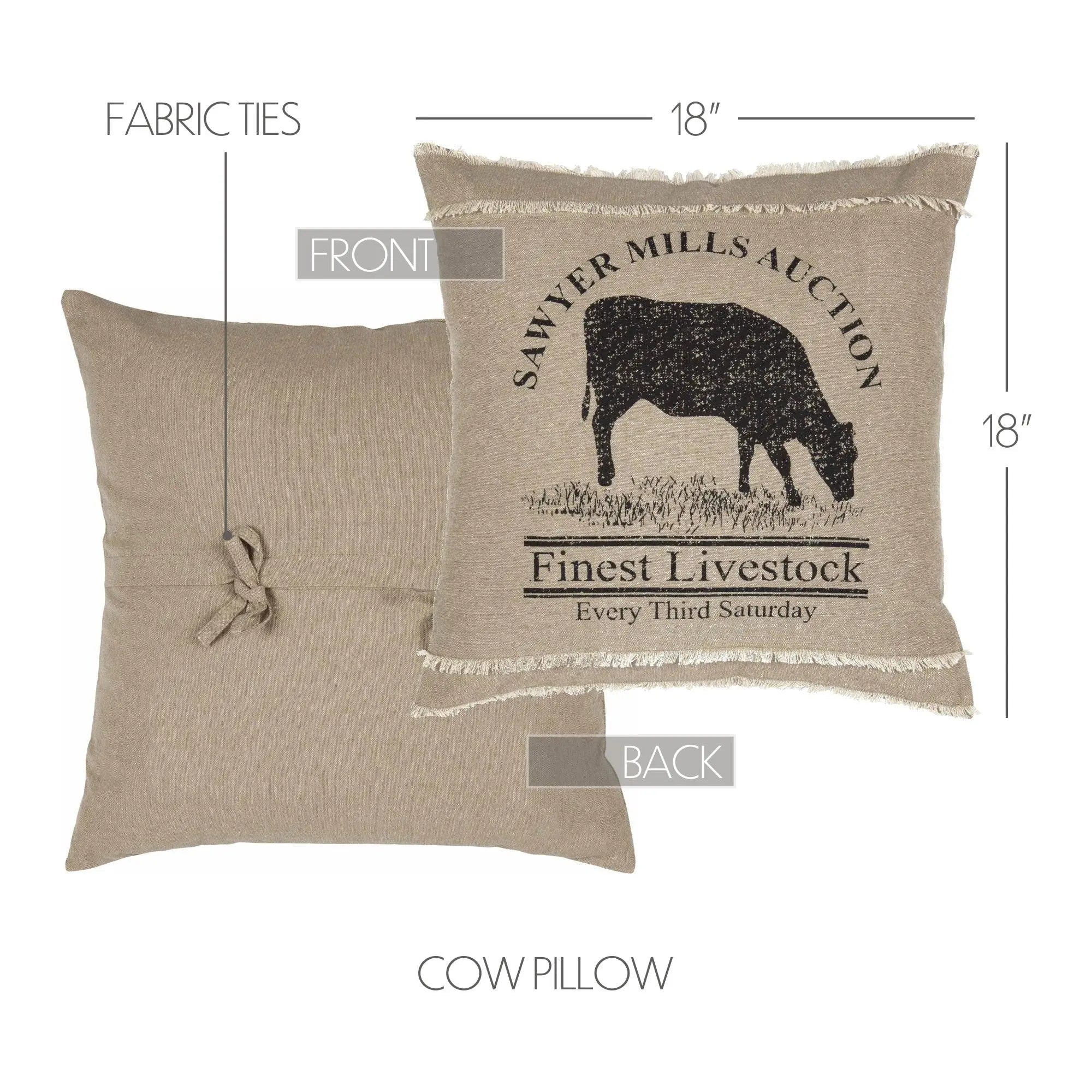 Cow pillow with fabric ties, dimensions, and branding details on a white background