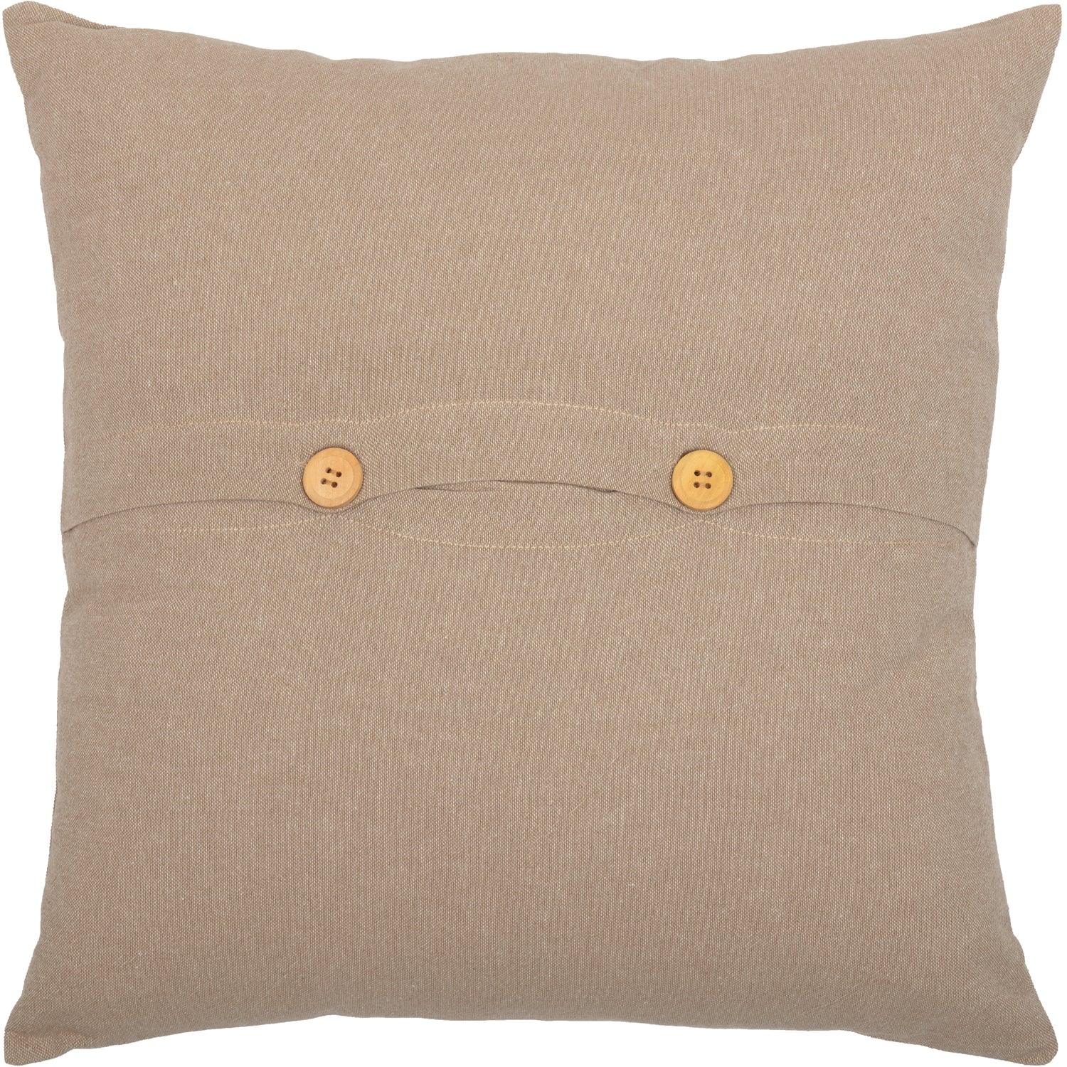 Beige pillow with two buttons on a white background