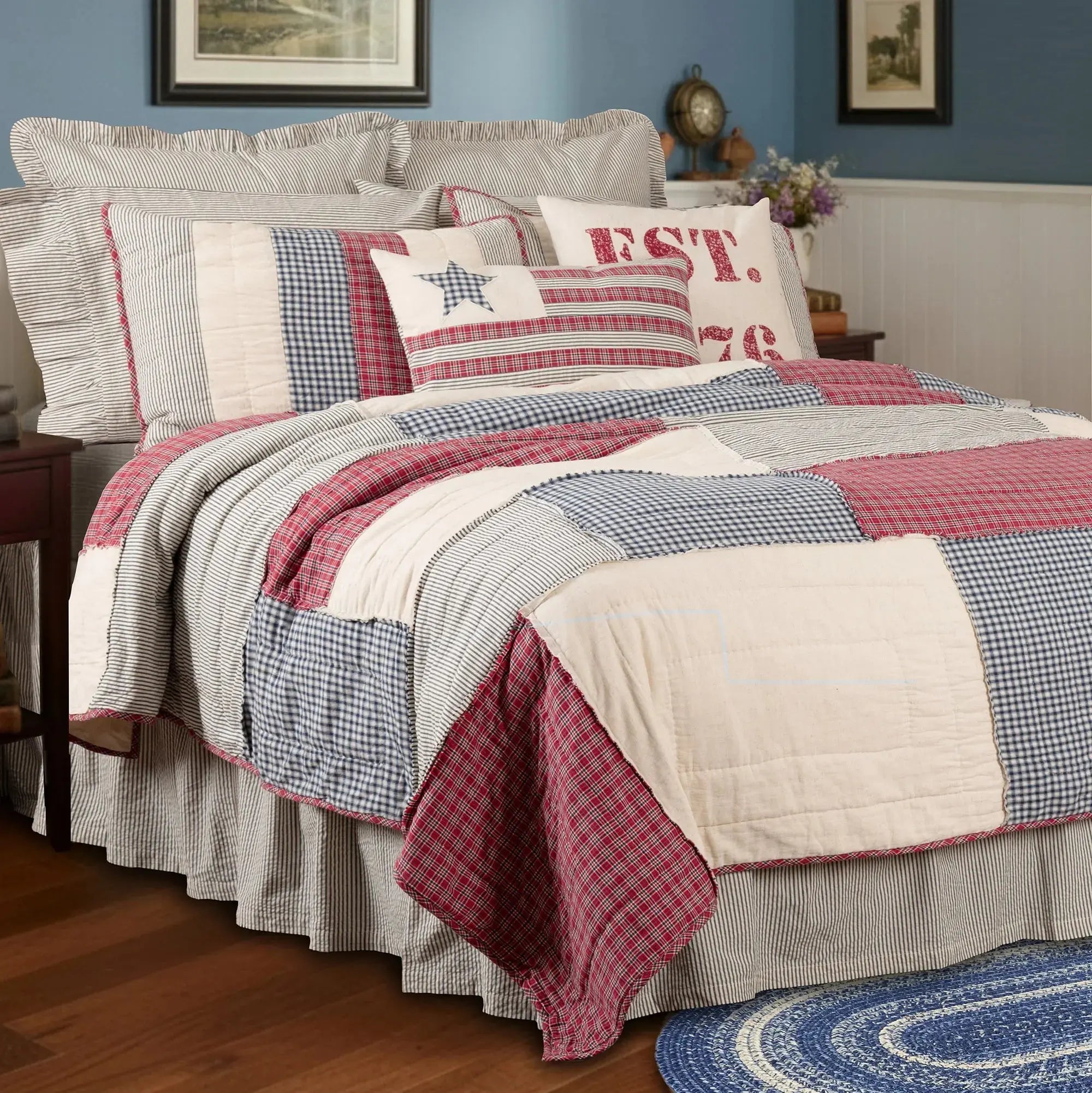 Red, white, and blue patchwork quilt set with star and plaid patterns, farmhouse bedroom decor