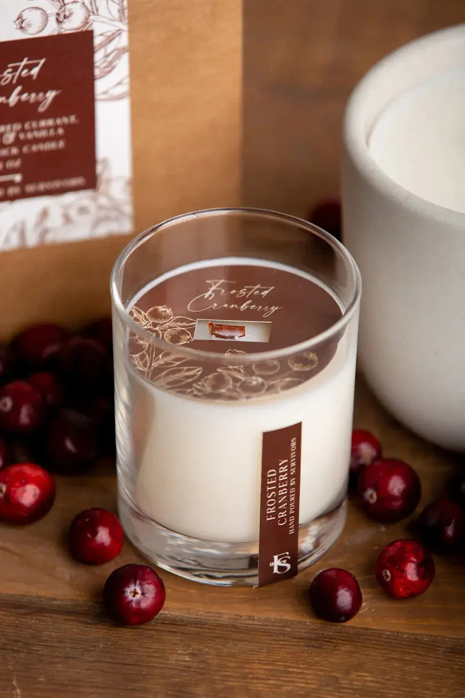Frosted Cranberry soy candle in glass jar with fresh cranberries, cozy farmhouse decor