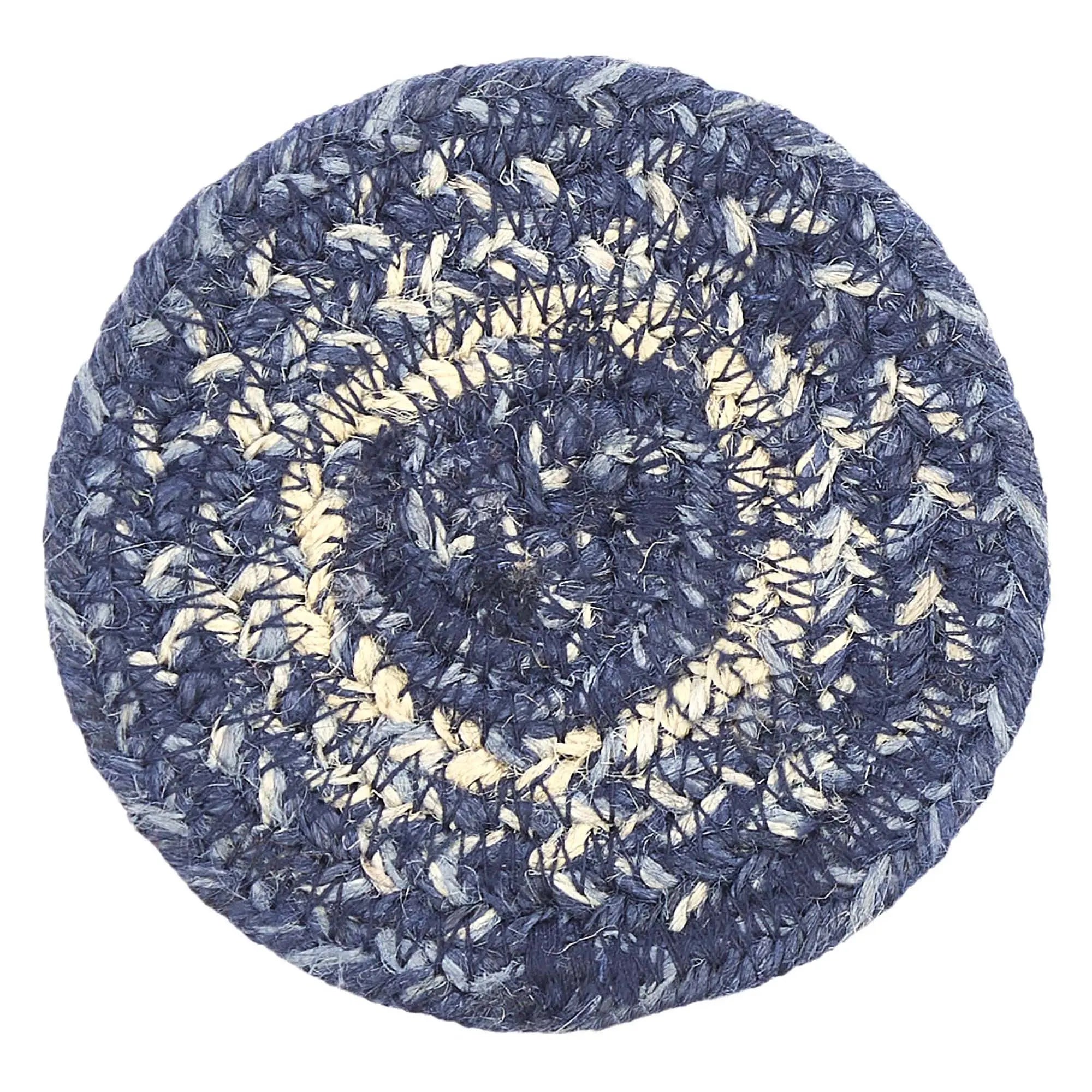 A round braided coaster with a textured spiral pattern in navy blue and cream, shown from a top-down view on a white background.