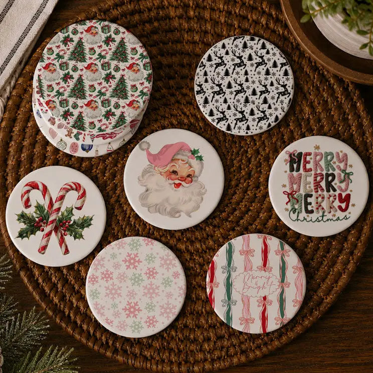 Set of Christmas-themed coasters on a woven mat