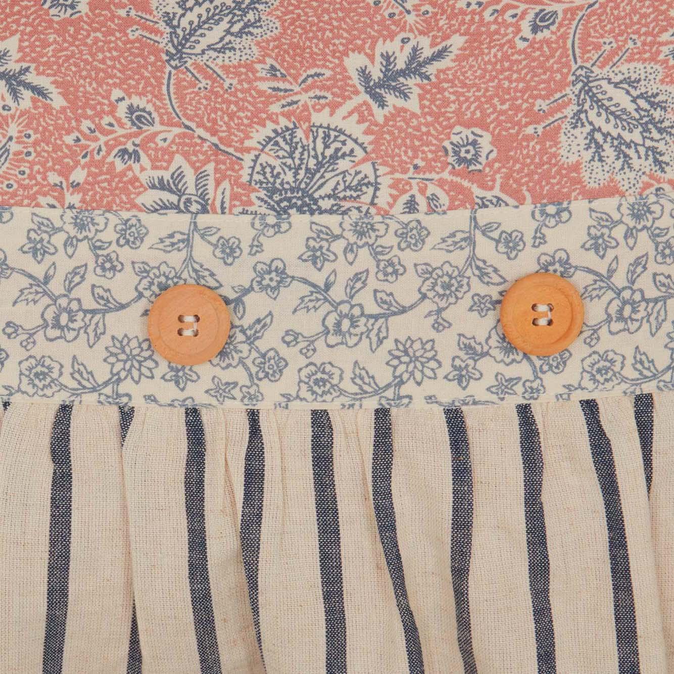 Cozy farmhouse apron with floral print, wooden buttons, and navy stripes for cottage kitchen decor