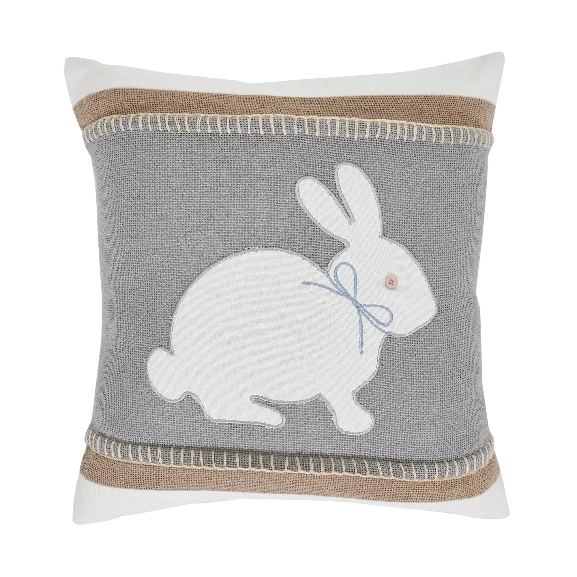 Gray farmhouse pillow with white bunny appliqué, burlap trim, and blue bow for cozy cottage decor