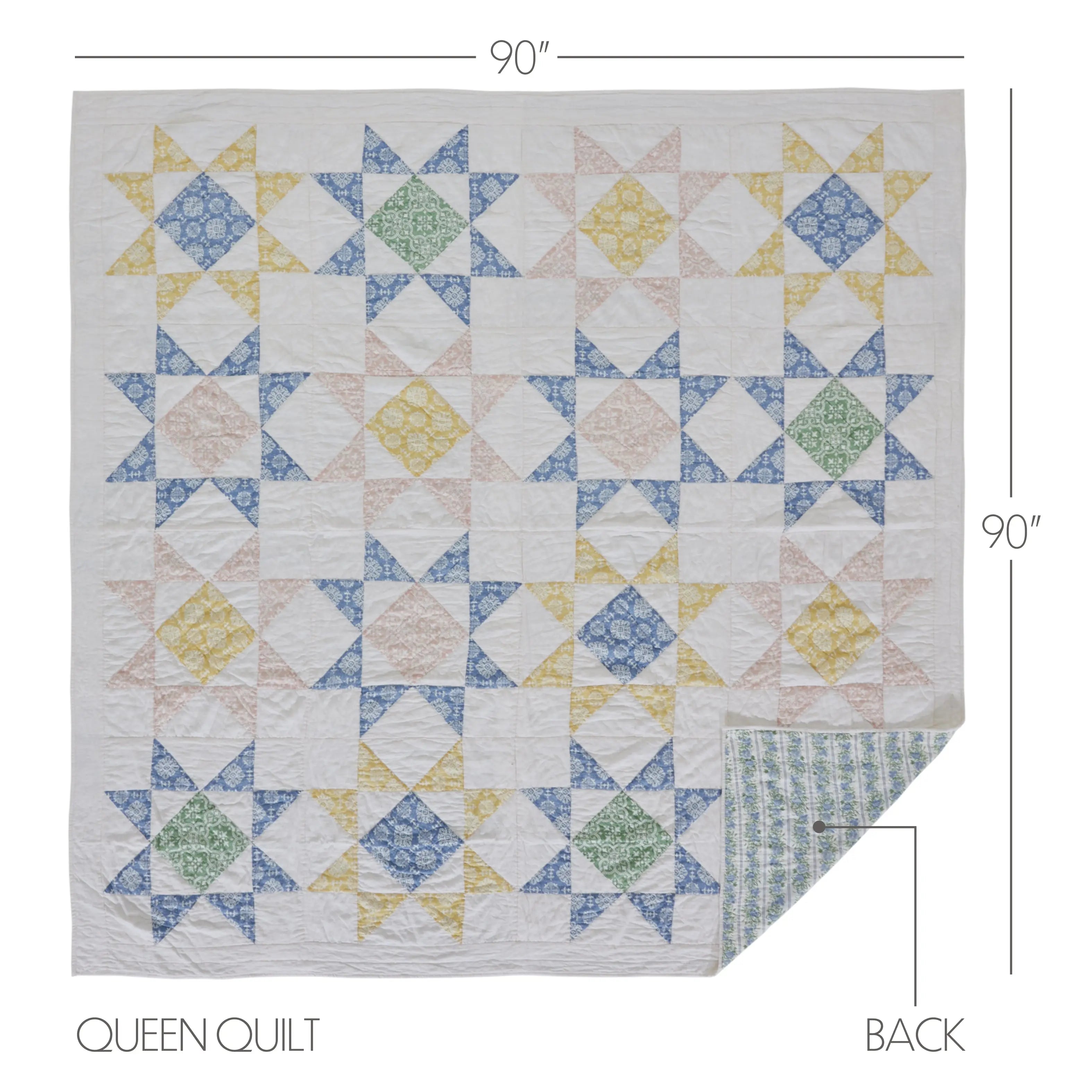 Queen quilt with star pattern and measurements on a white background