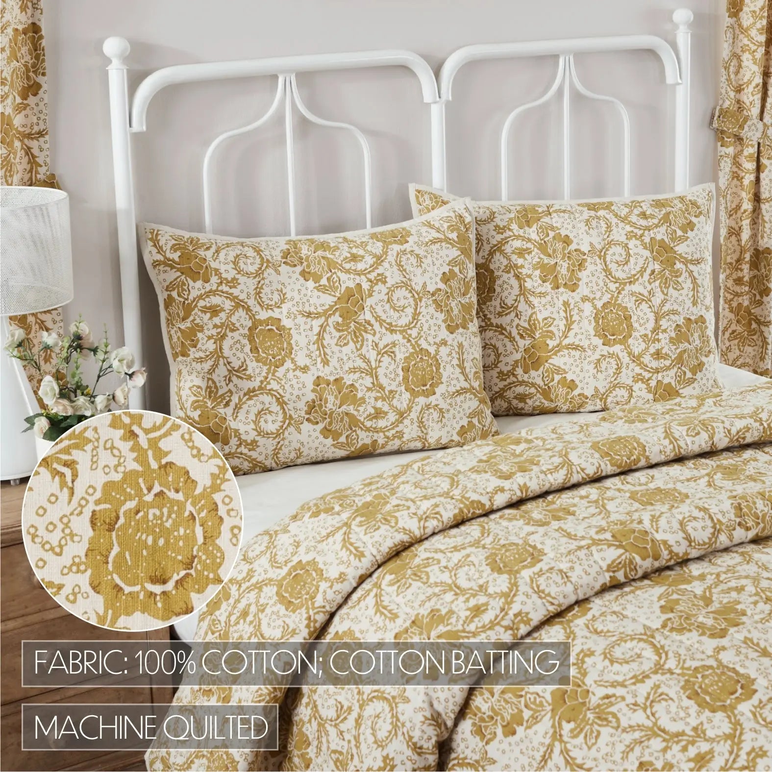 A bed dressed in a cream and mustard yellow damask-patterned cotton bedding set, including a comforter and two matching pillowcases, styled with a white metal headboard. A circular inset shows a close-up of the fabric pattern, and text overlays specify 'FABRIC: 100% COTTON; COTTON BATTING' and 'MACHINE QUILTED'.