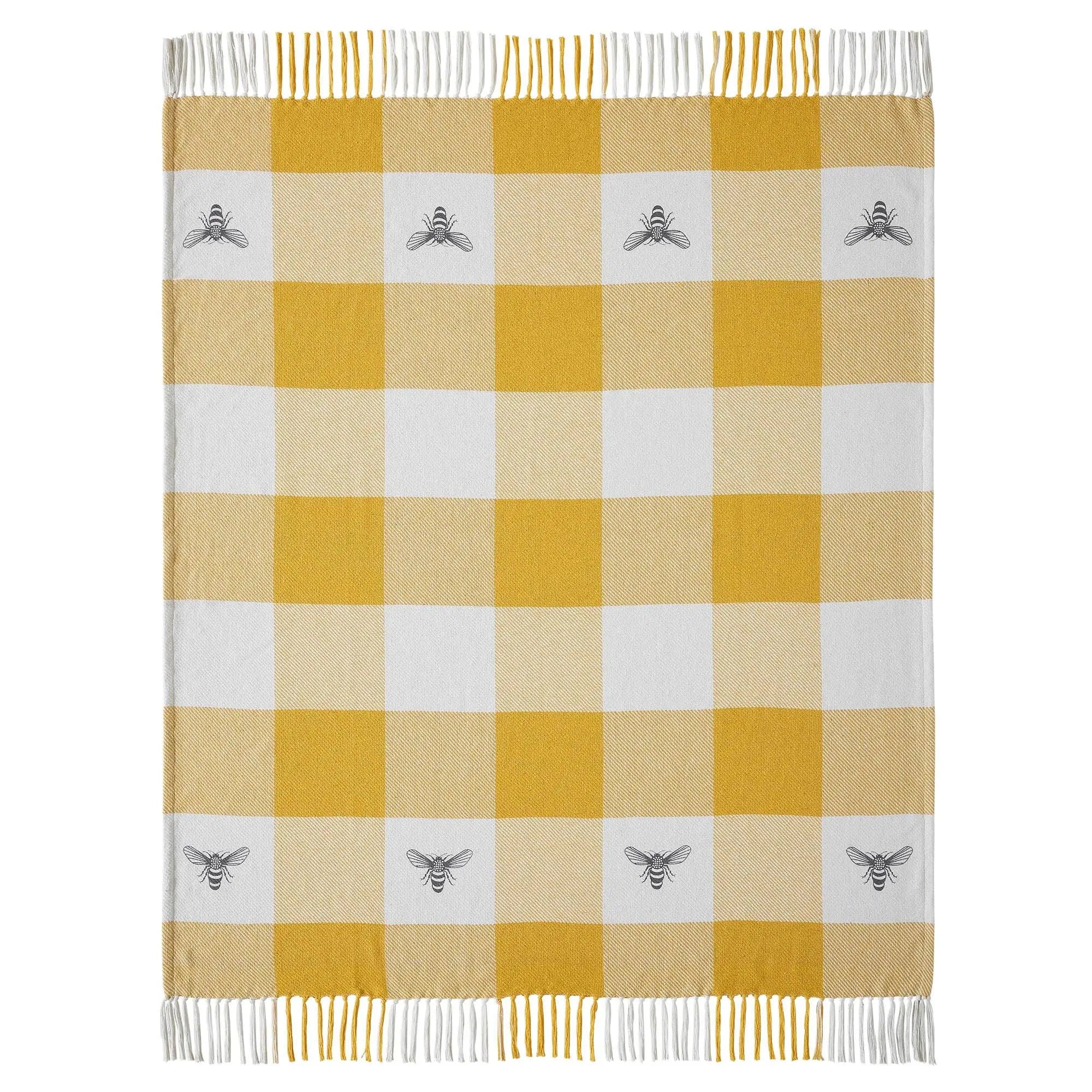 Yellow and white gingham throw blanket with bee motifs and fringe, cozy farmhouse decor