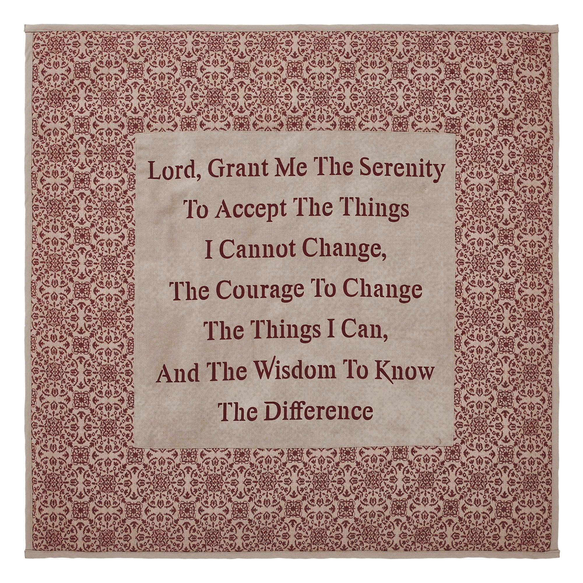 Decorative mat with a quote on a patterned background