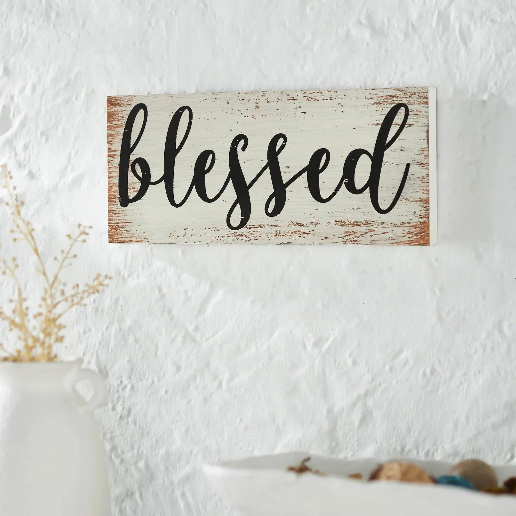 Rustic wooden sign with 'blessed' in black script, perfect for cozy farmhouse decor