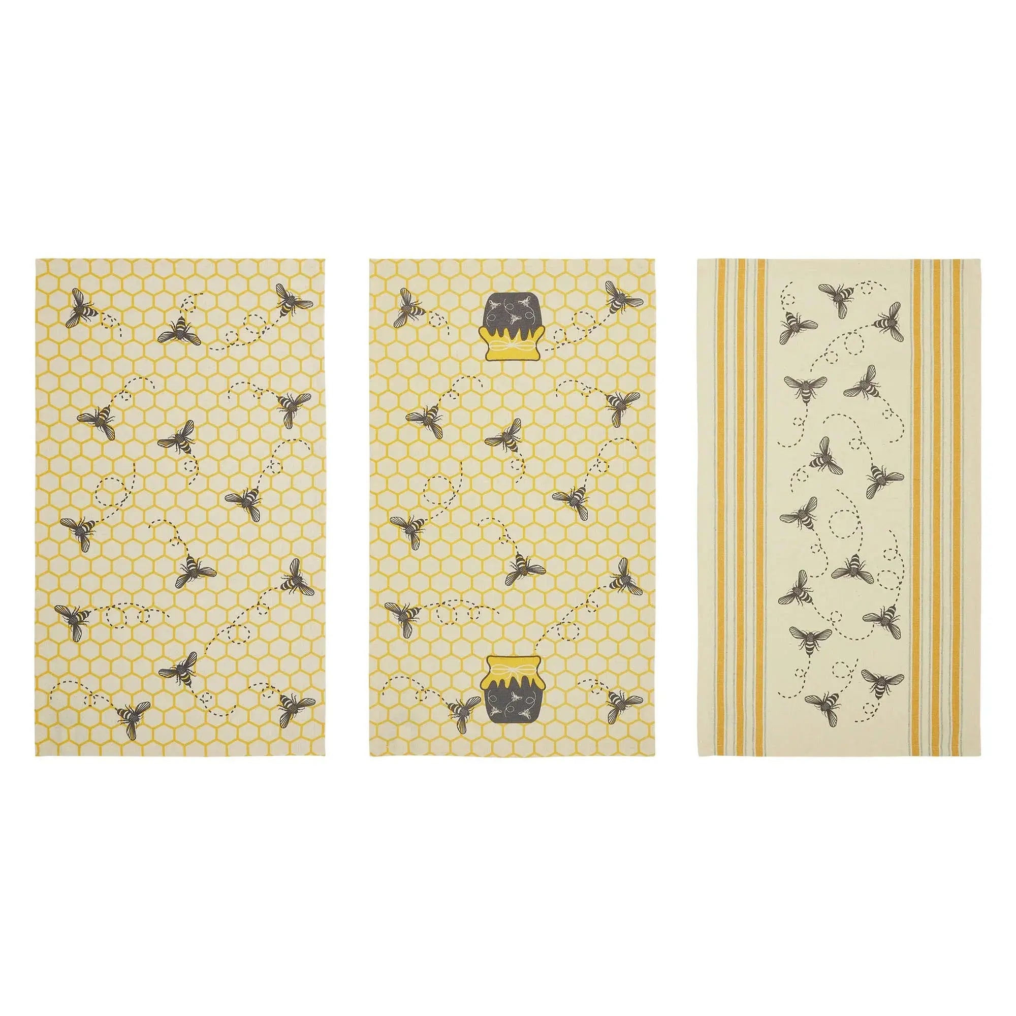 Set of three bee-themed kitchen towels with honeycomb and honey jar designs, perfect for farmhouse decor