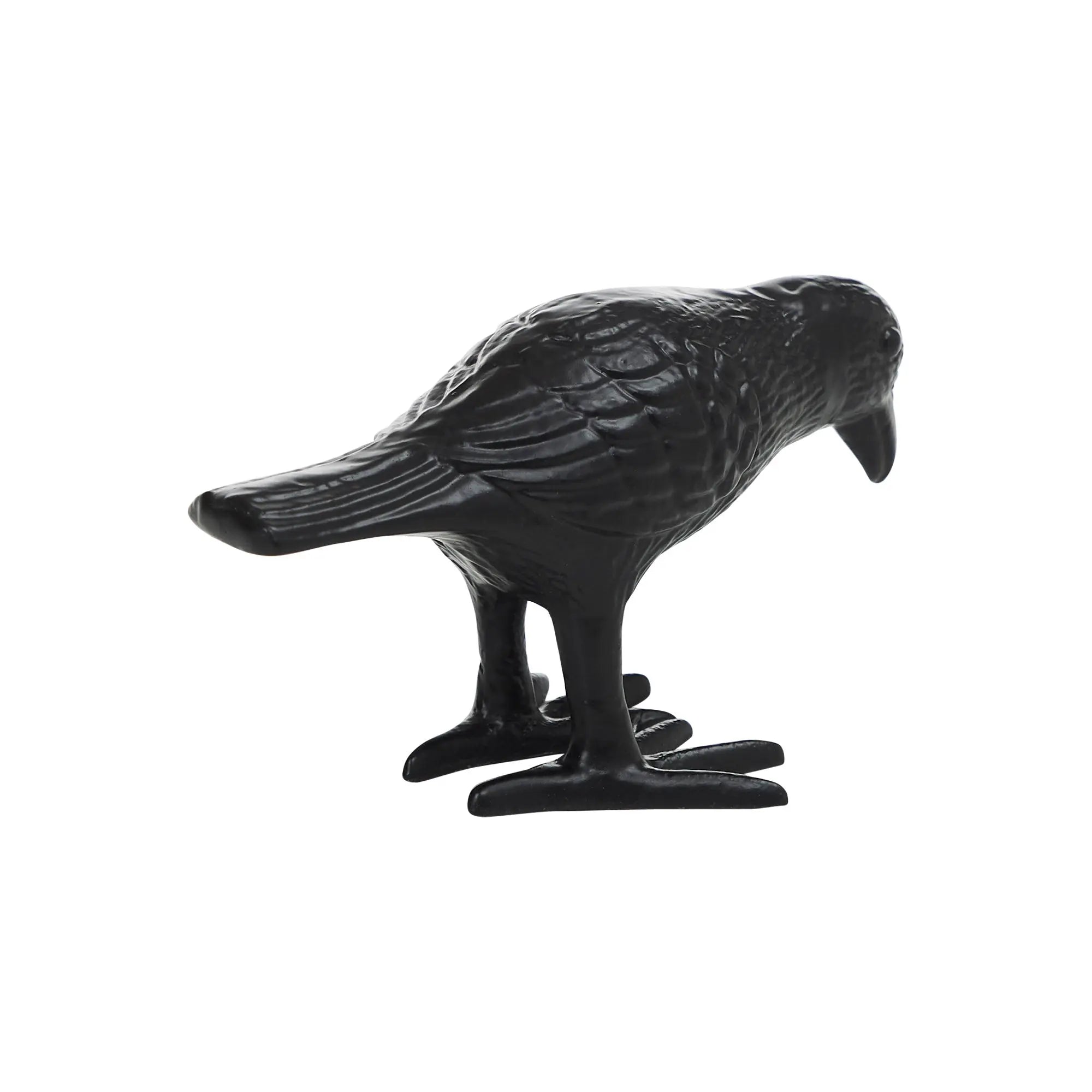 Black bird figurine on a white background