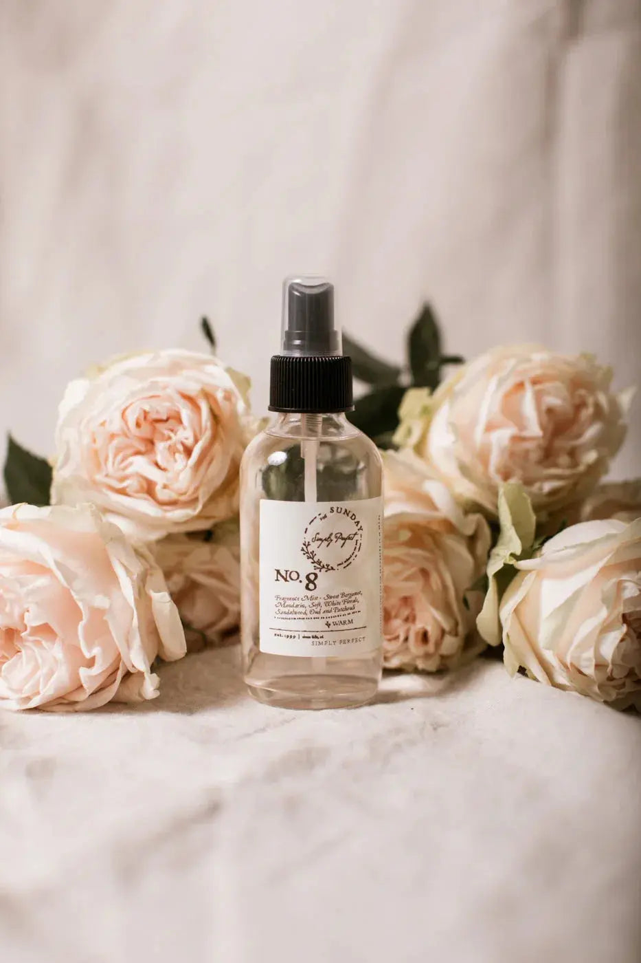 No. 8 fragrance mist with soft pink roses, cozy farmhouse home decor, warm scents for peaceful living spaces
