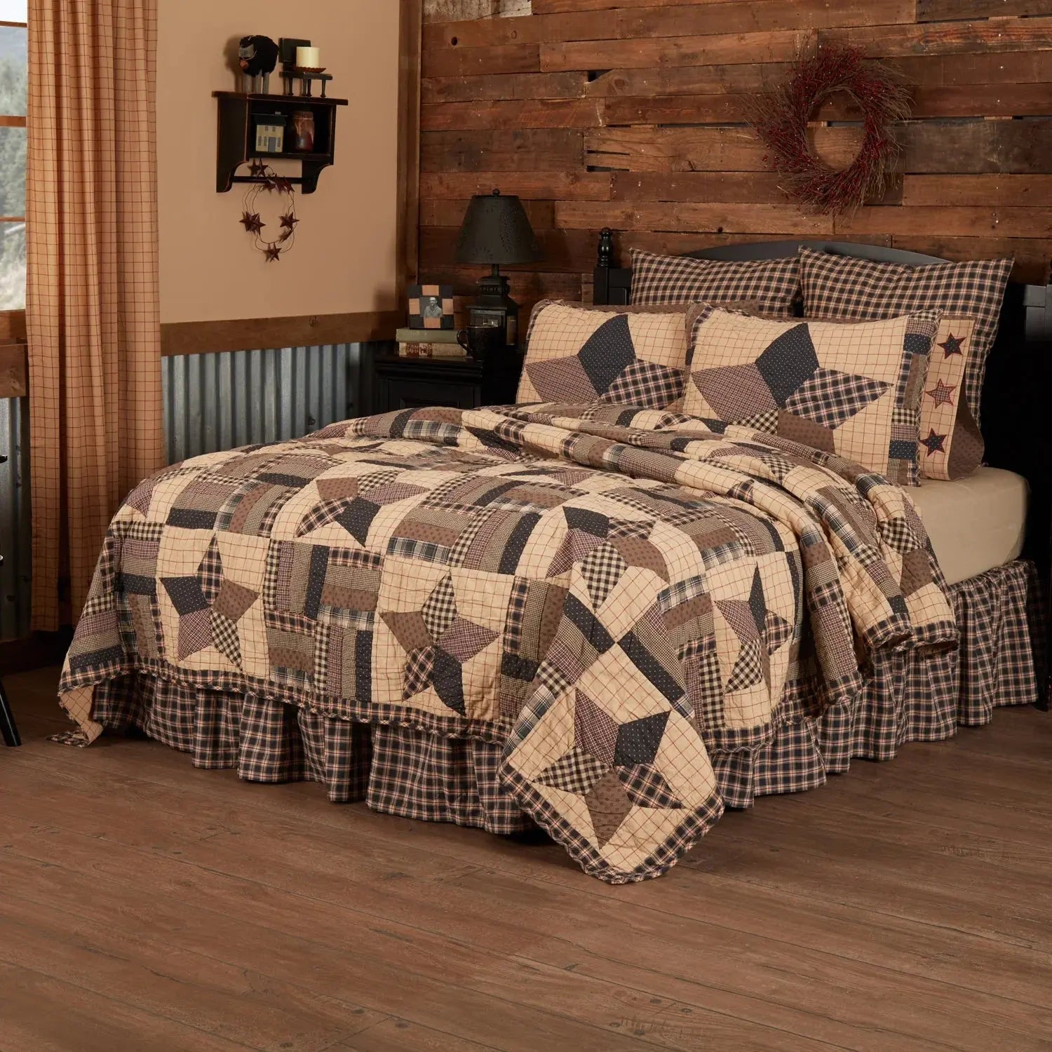 Farmhouse quilt set with star pattern, plaid bedding, rustic wood wall, cozy cottage bedroom decor