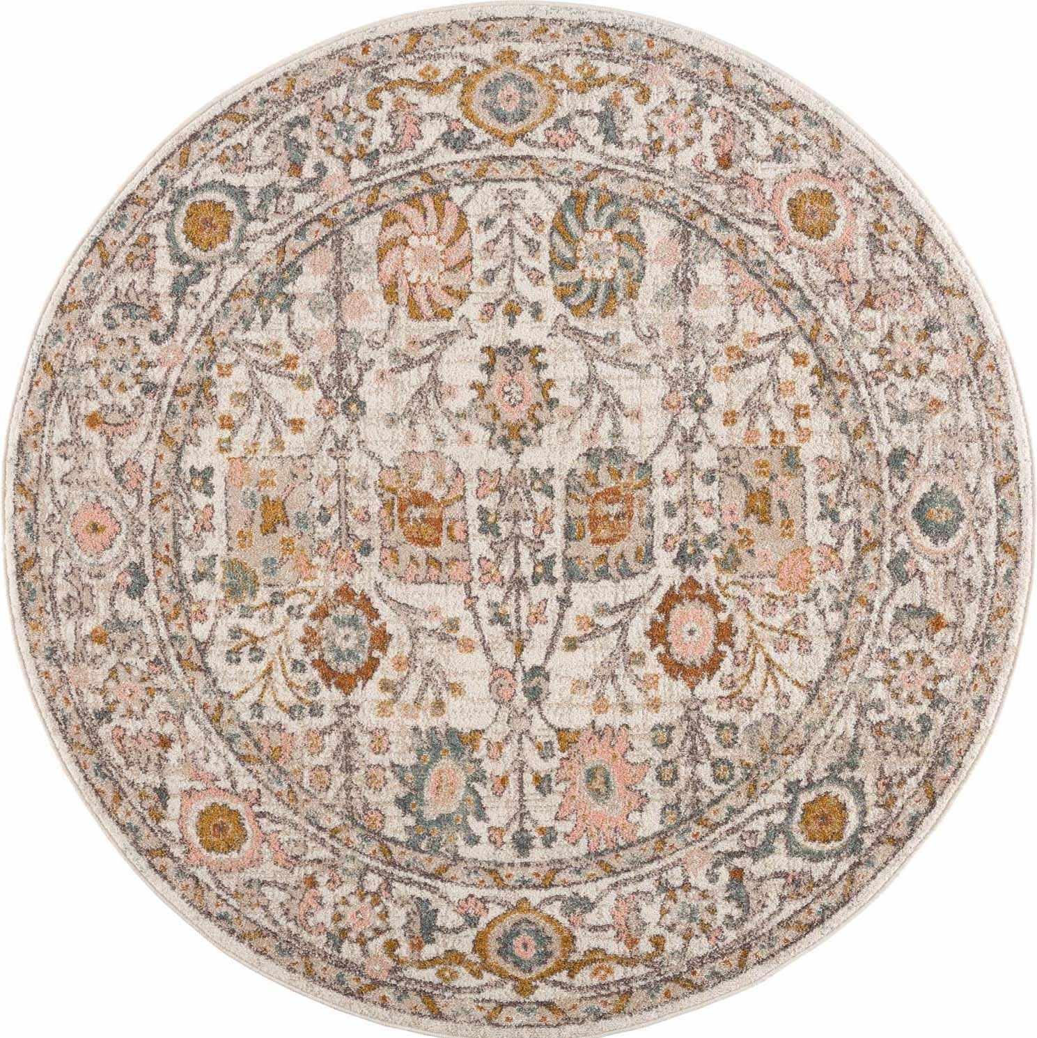 Round vintage-style area rug with floral medallion pattern in soft pastel tones for cozy farmhouse decor