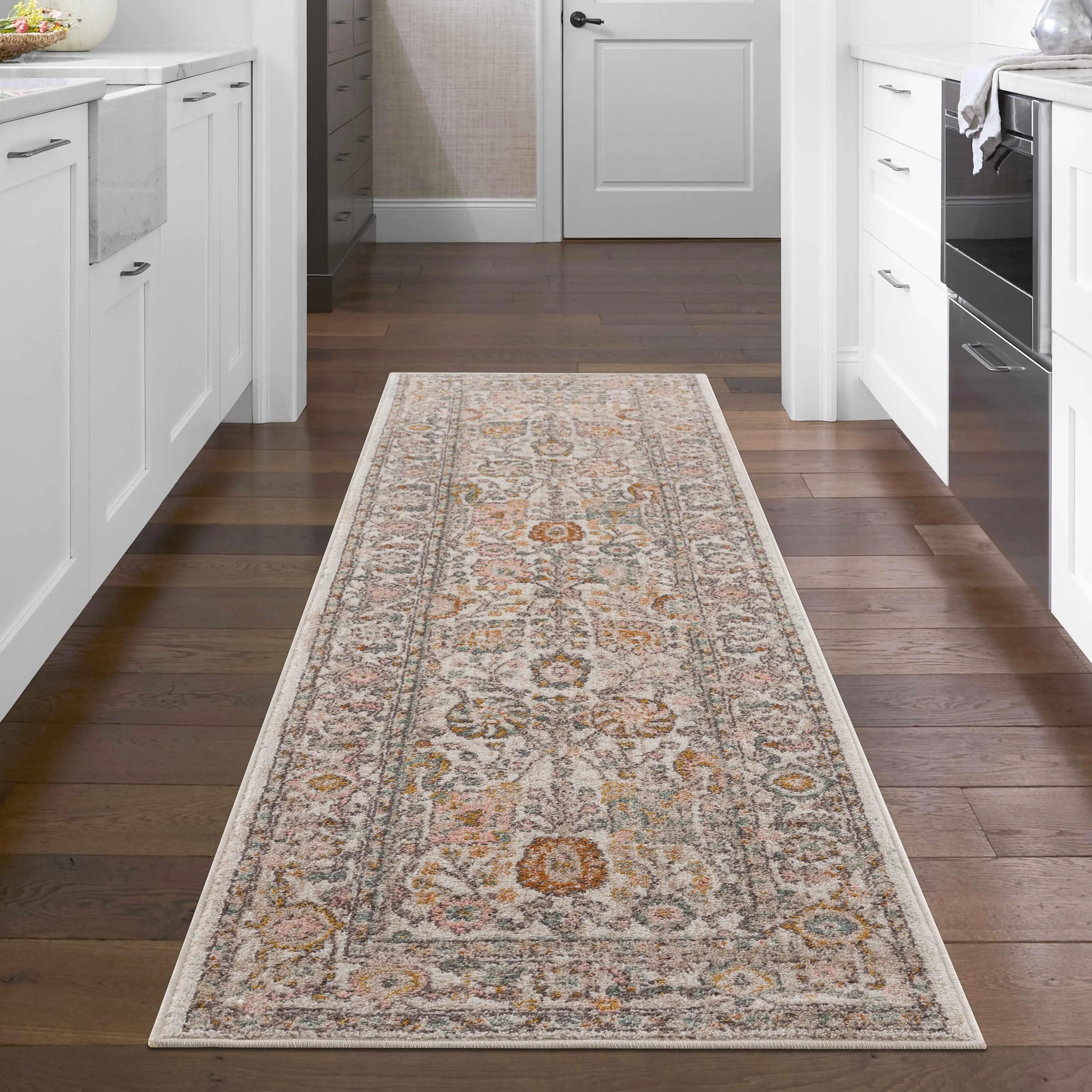 Vintage floral runner rug for cozy farmhouse kitchen decor with soft pastel tones