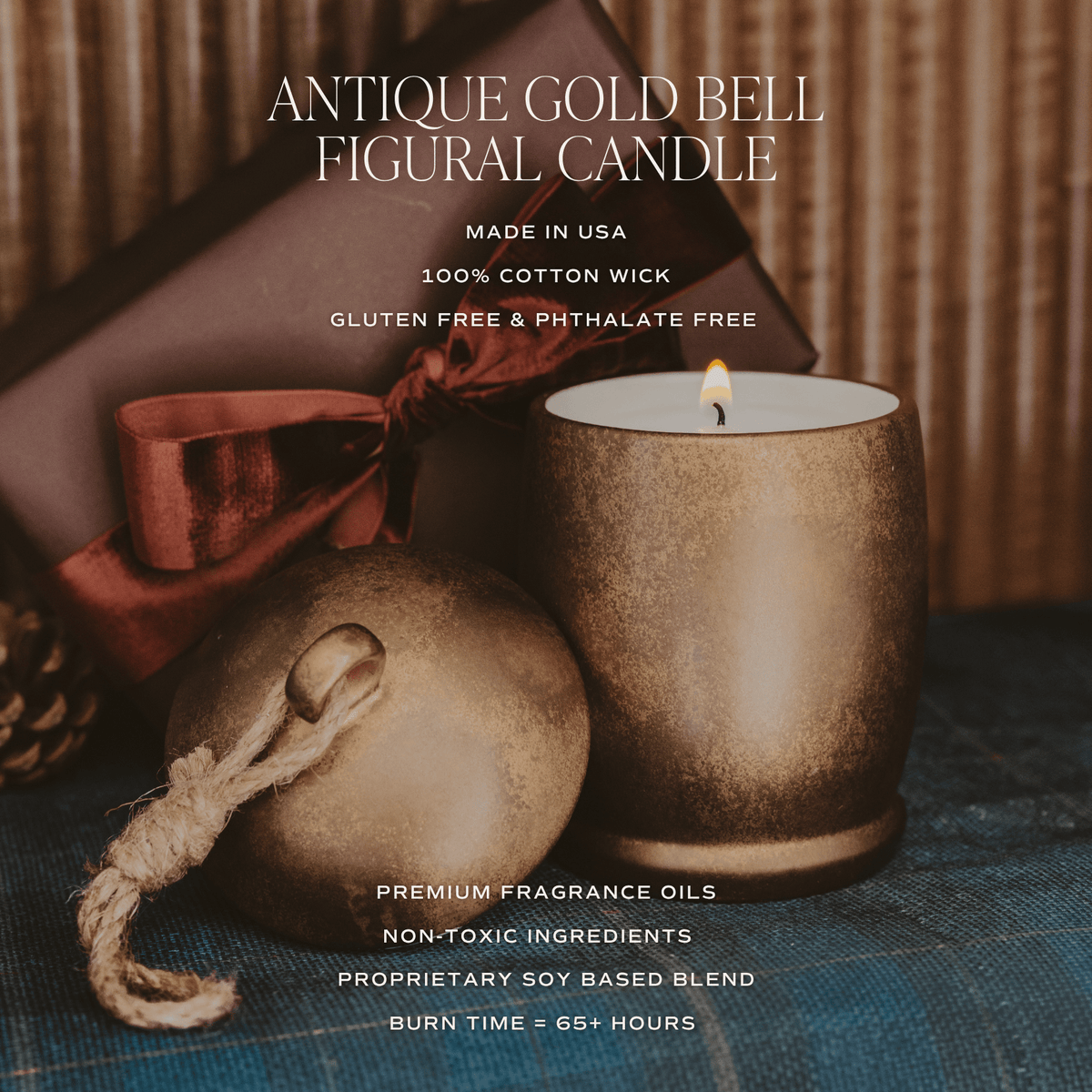 An antique gold bell figural candle shown lit next to a decorative gold ornament and a wrapped gift box, with text overlays highlighting product features like 'Made in USA' and '100% Cotton Wick'.