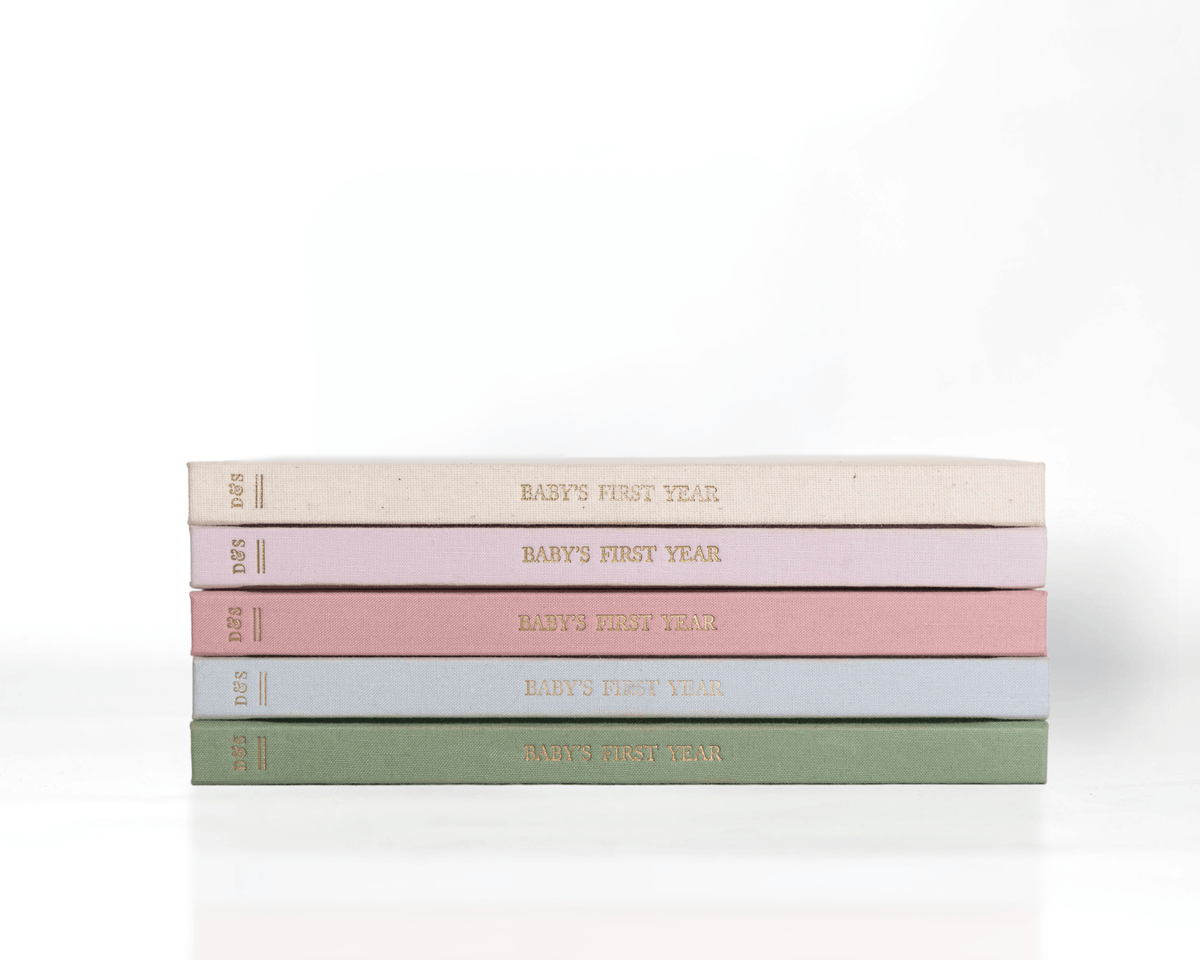 5 baby first year books in different colors