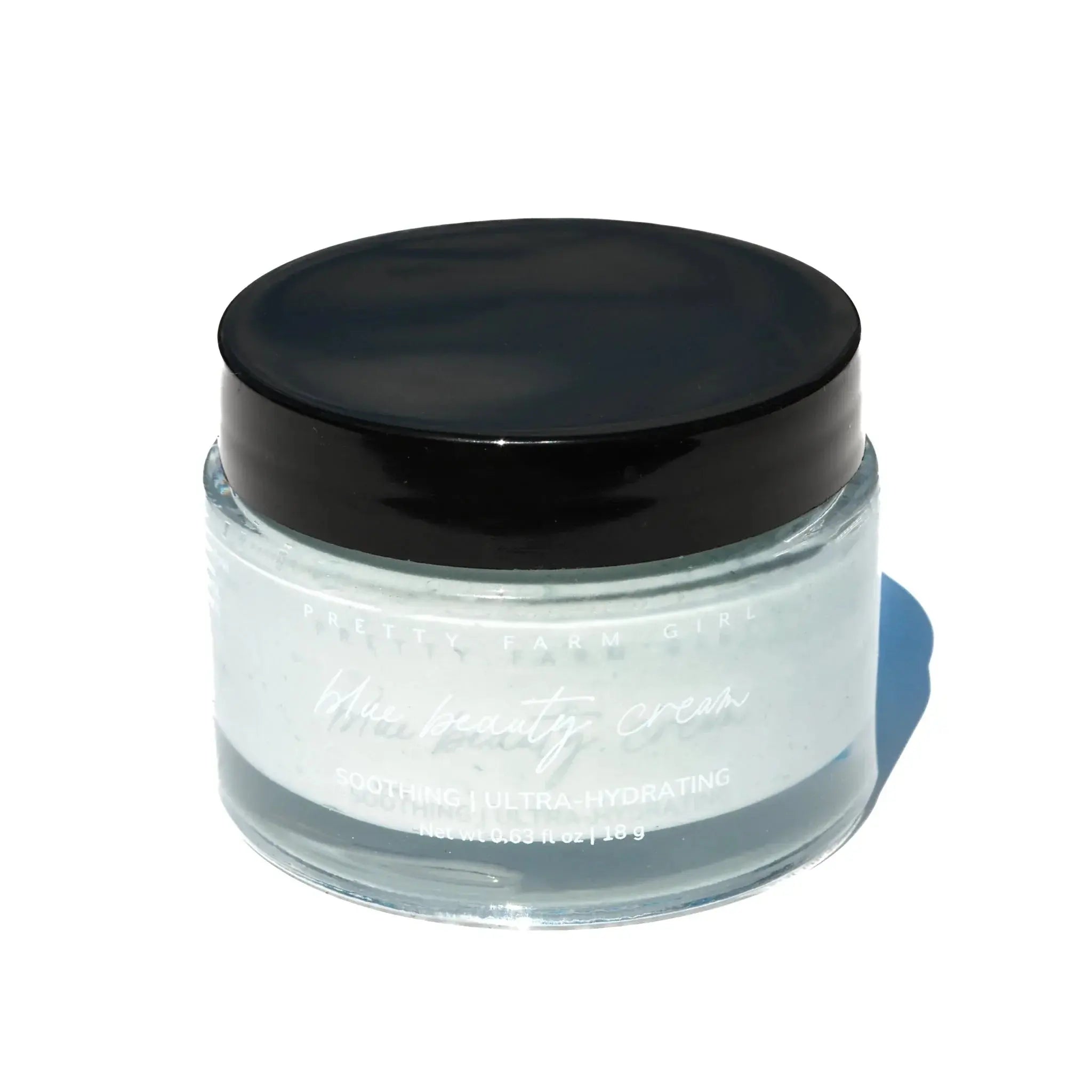 Pretty Farm Girl Blue Beauty Cream, soothing ultra-hydrating face moisturizer in glass jar with black lid