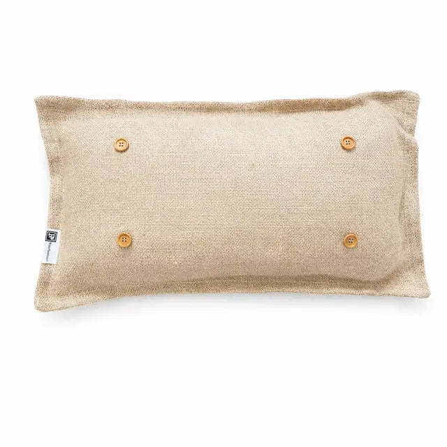 A rectangular natural linen lumbar pillow with four wooden buttons on the back, shown on a clean white background.