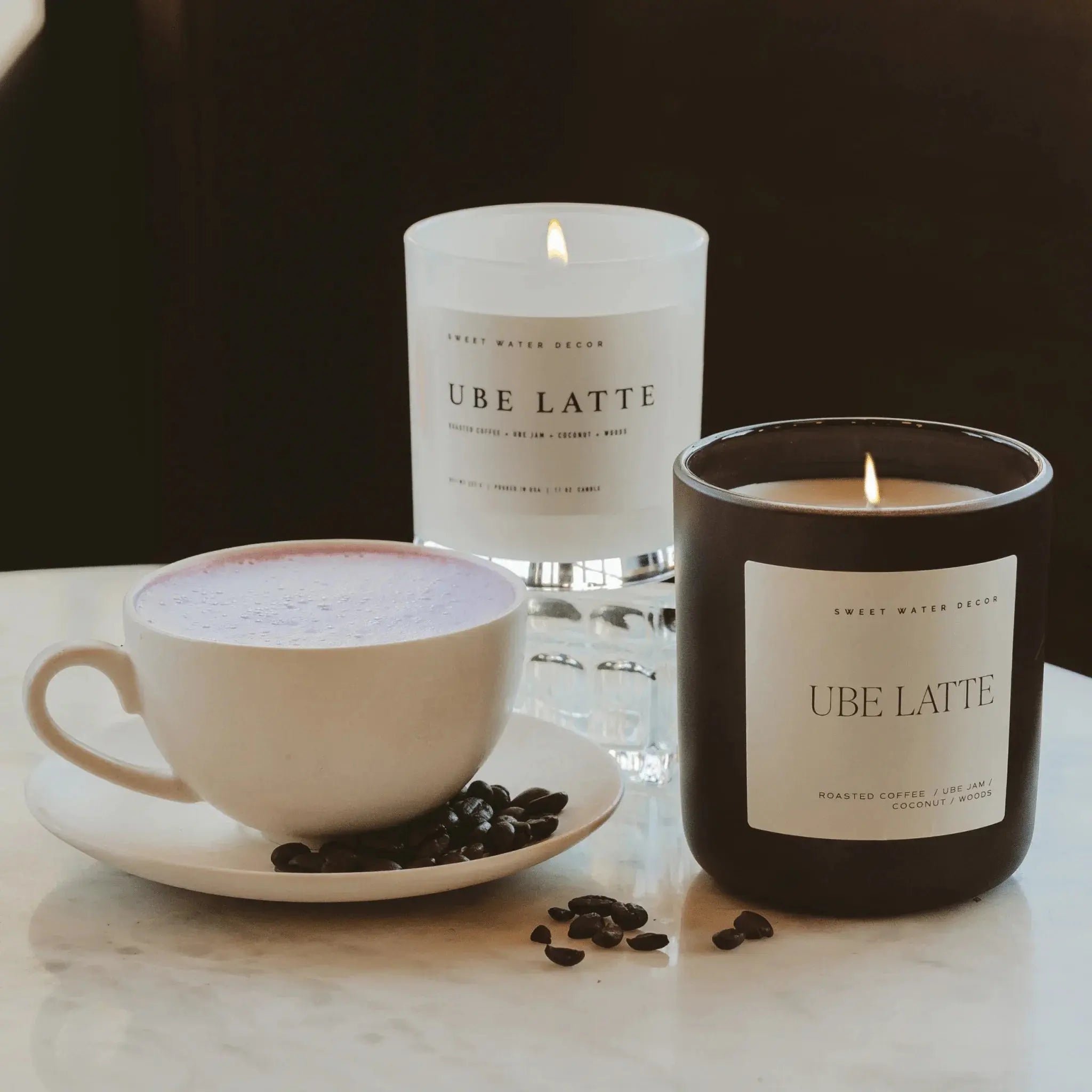Ube Latte scented candles with coffee beans and a latte cup, cozy home decor