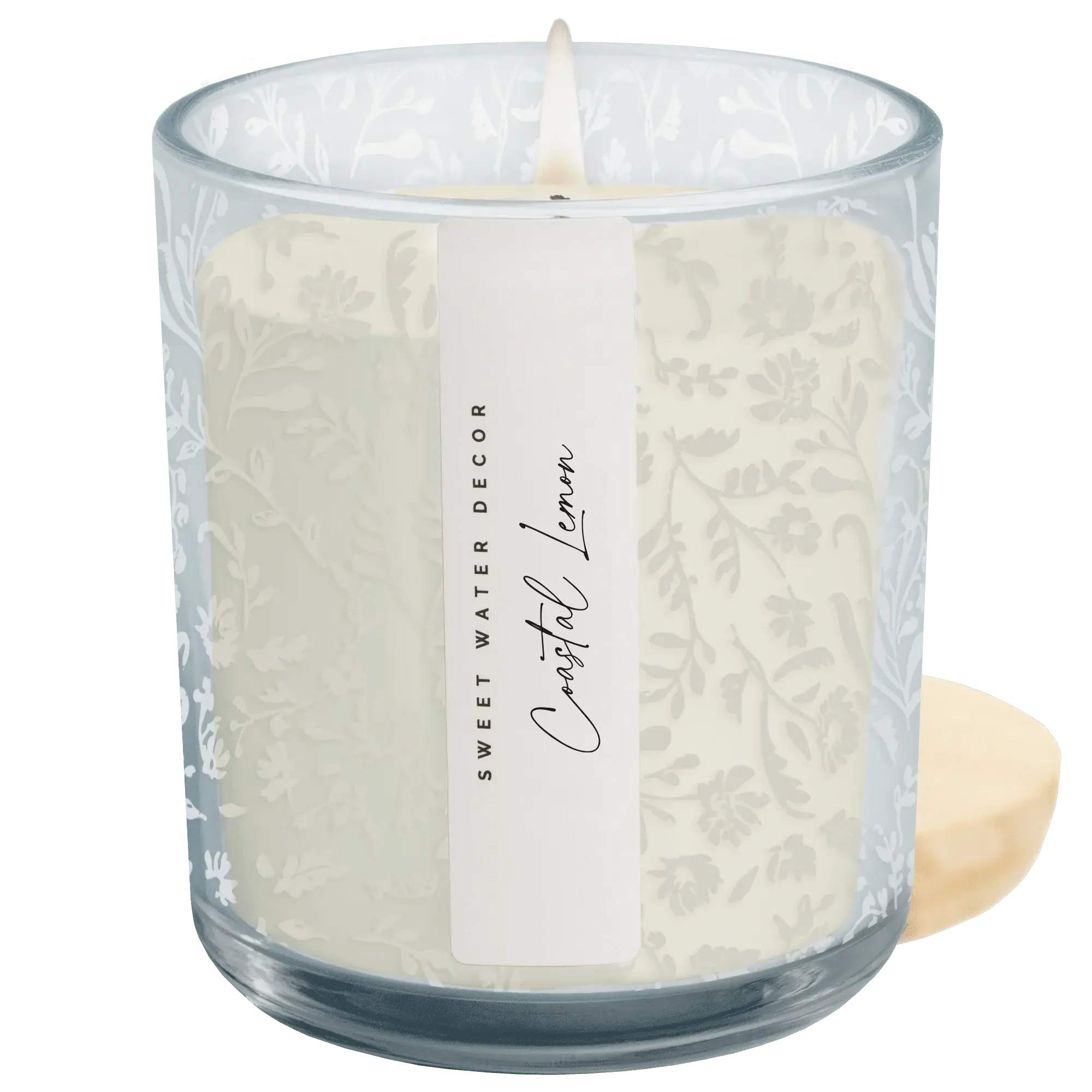 Cozy Coastal Lemon candle in floral glass jar, perfect for farmhouse decor and peaceful living spaces.