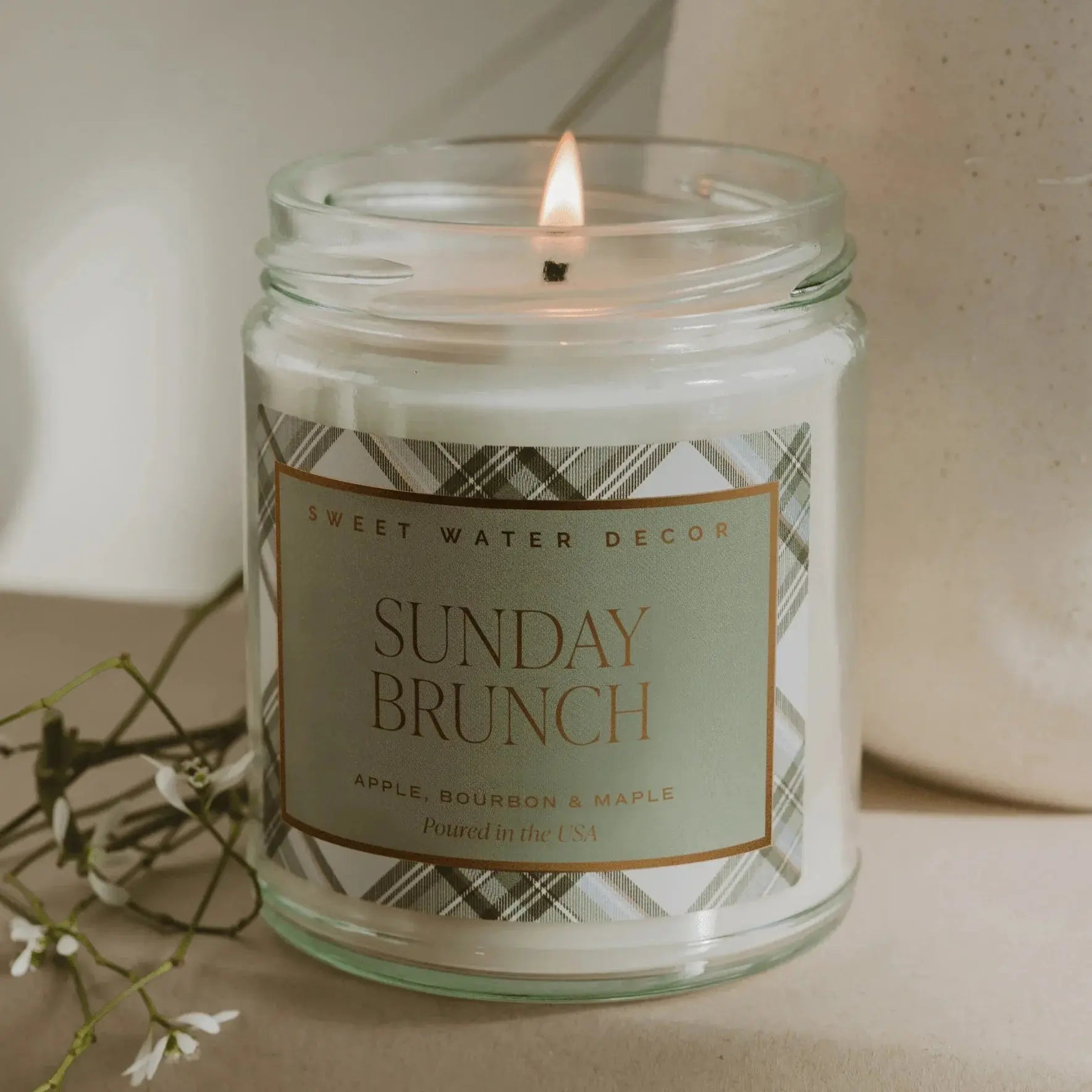 Sunday Brunch scented candle with apple bourbon maple notes, cozy farmhouse decor, lit in glass jar