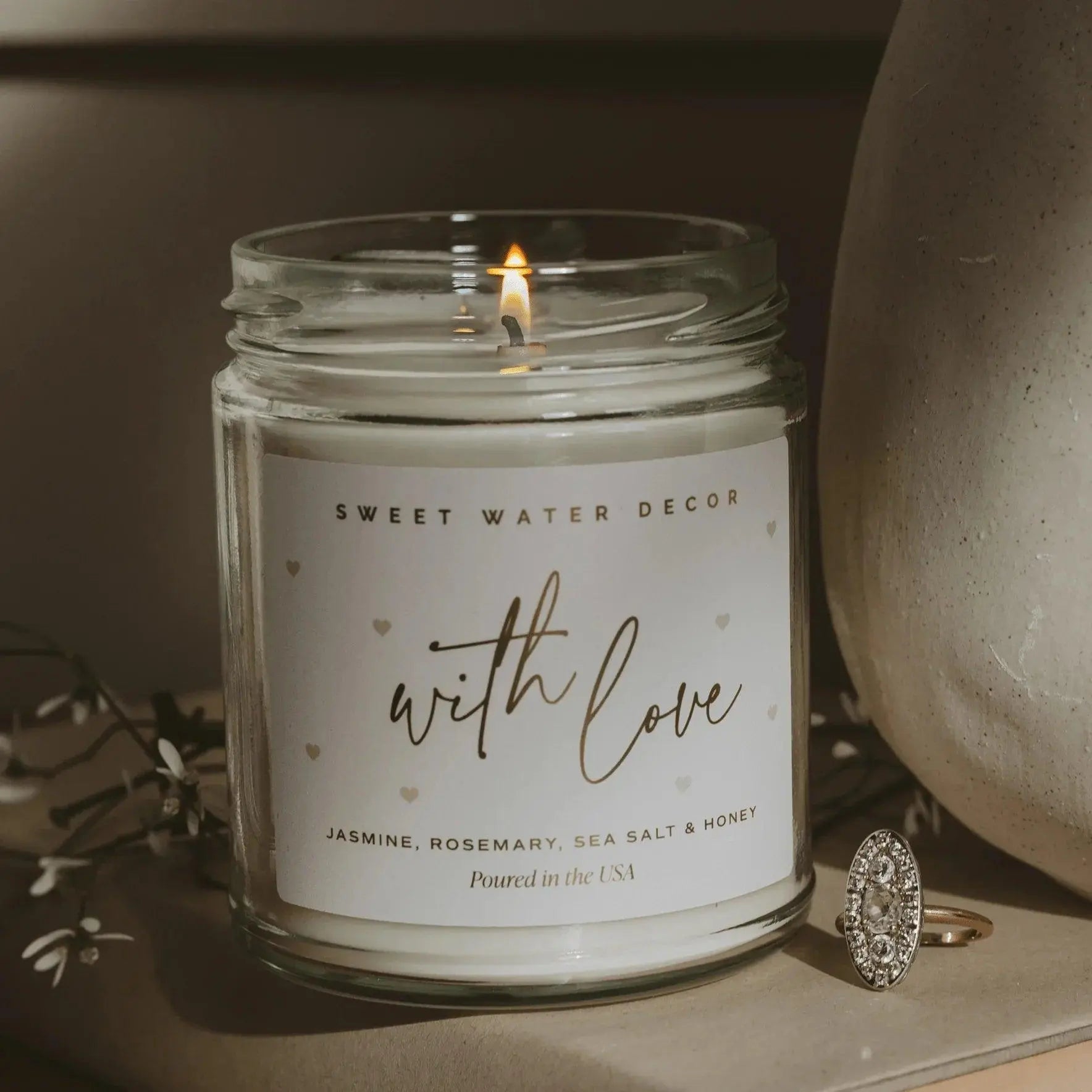Lit 'With Love' scented candle in glass jar, jasmine rosemary sea salt honey, cozy farmhouse decor