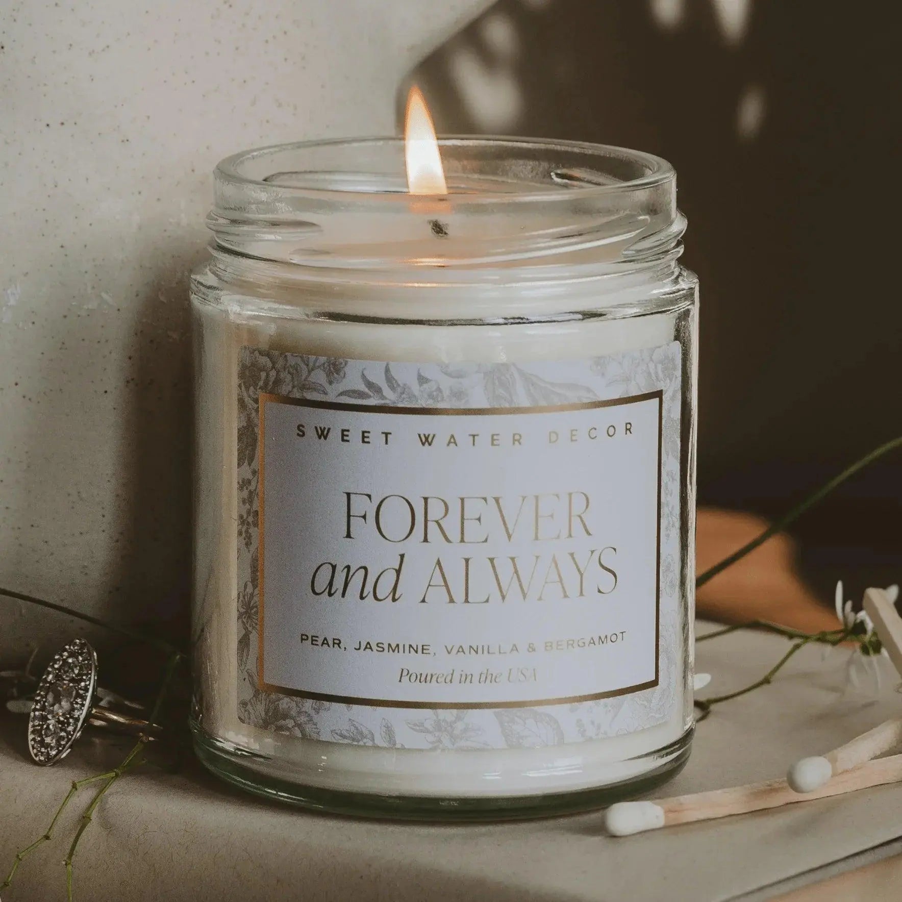 Lit 'Forever and Always' scented candle with pear, jasmine, vanilla & bergamot notes, cozy farmhouse decor