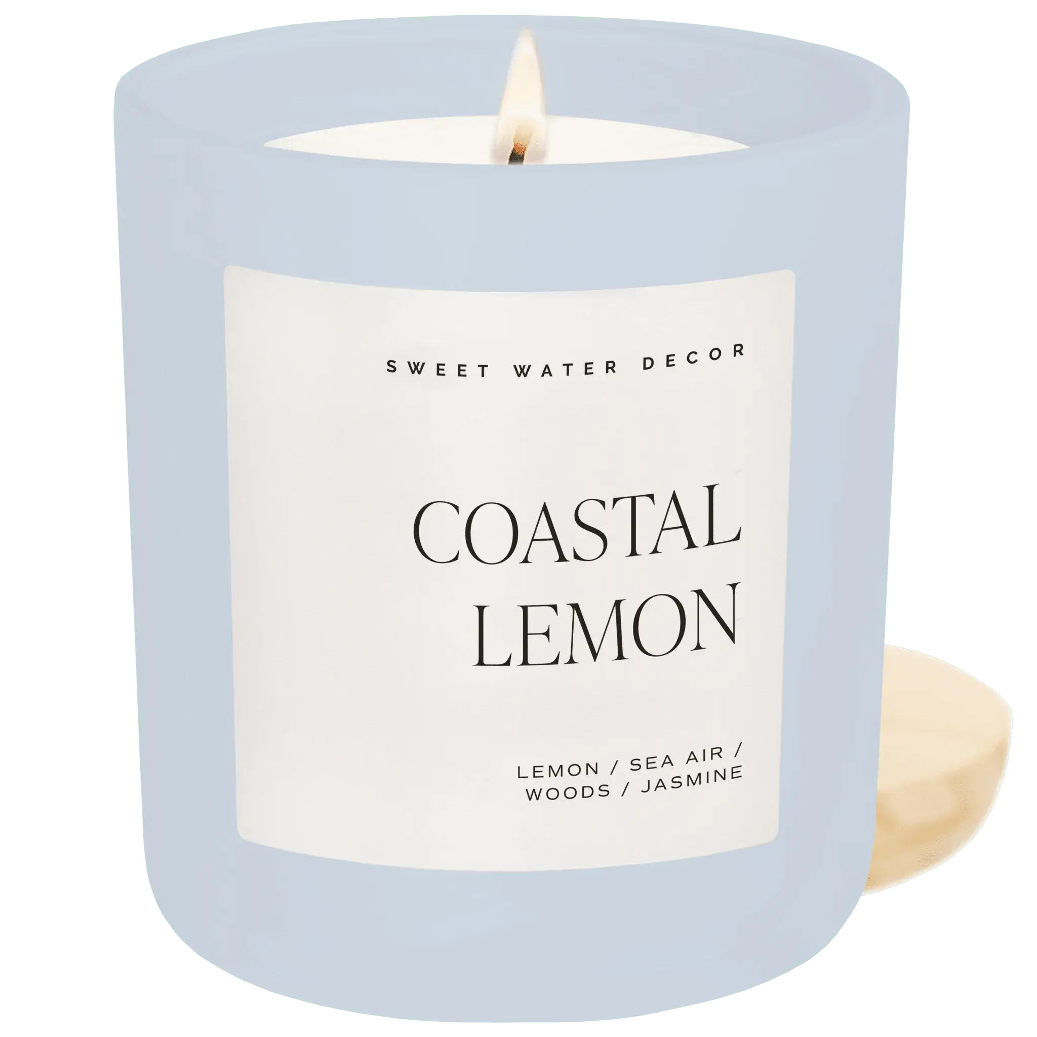 Coastal Lemon scented candle in light blue glass jar, perfect for cozy farmhouse decor with lemon, sea air, woods, jasmine notes