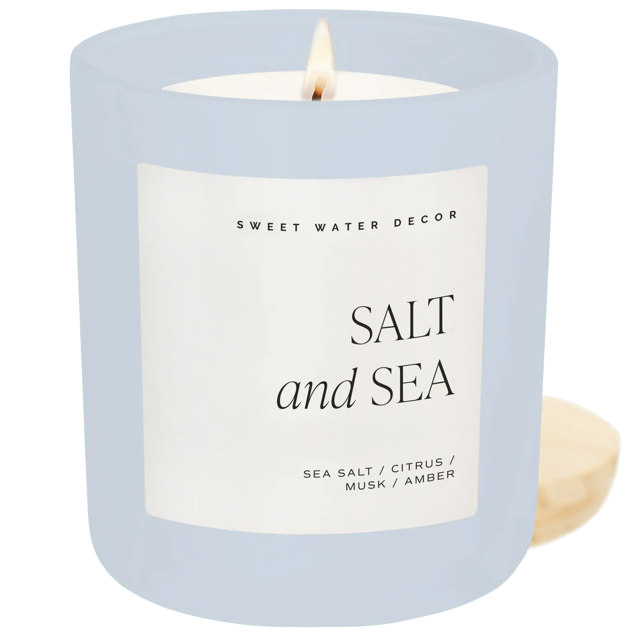 Salt and Sea scented candle in light blue glass with wooden lid, perfect for cozy farmhouse decor