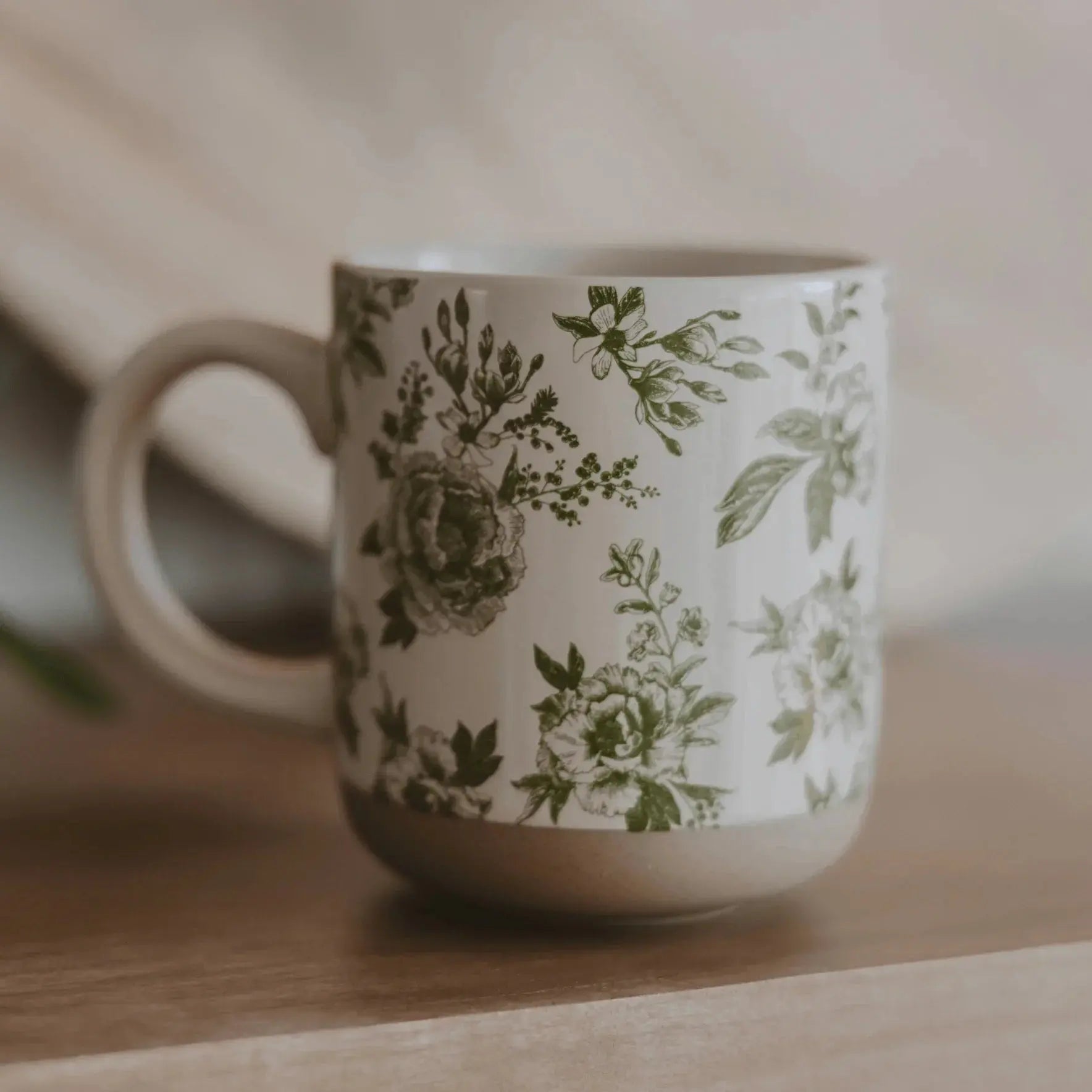 Floral ceramic mug with green botanical design, cozy farmhouse style home decor