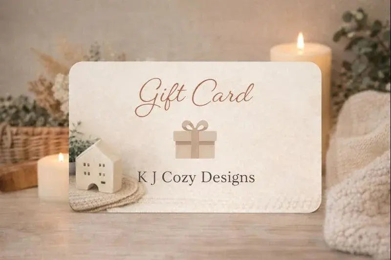 K J Cozy Designs gift card with farmhouse decor, candles, and cozy cottage style elements