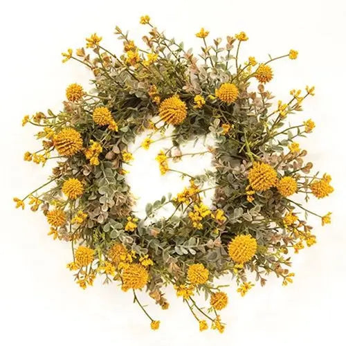 Floral wreath with yellow flowers and green leaves on a white background