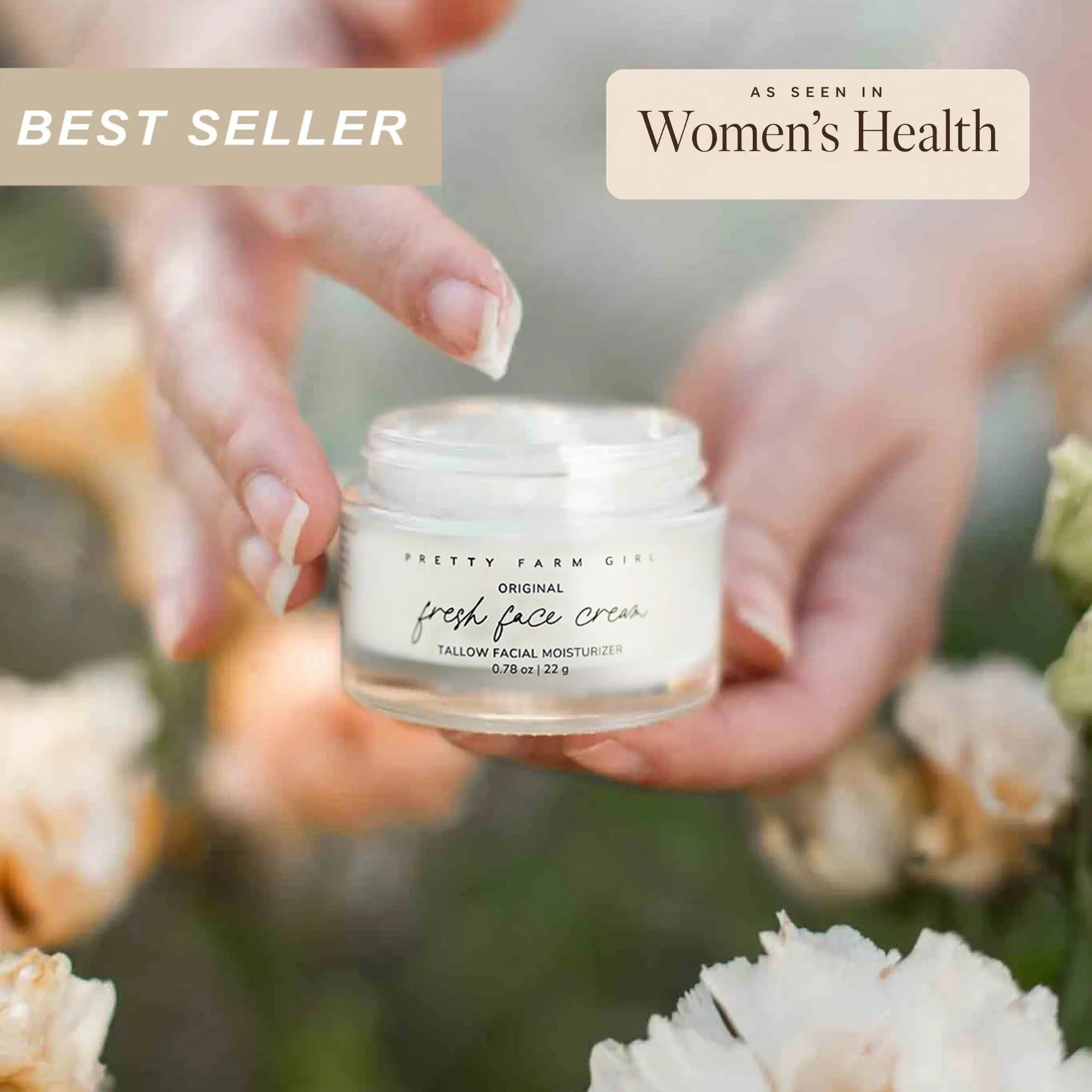 Hand holding a jar of 'Pretty Farm' fresh face cream with flowers in the background
