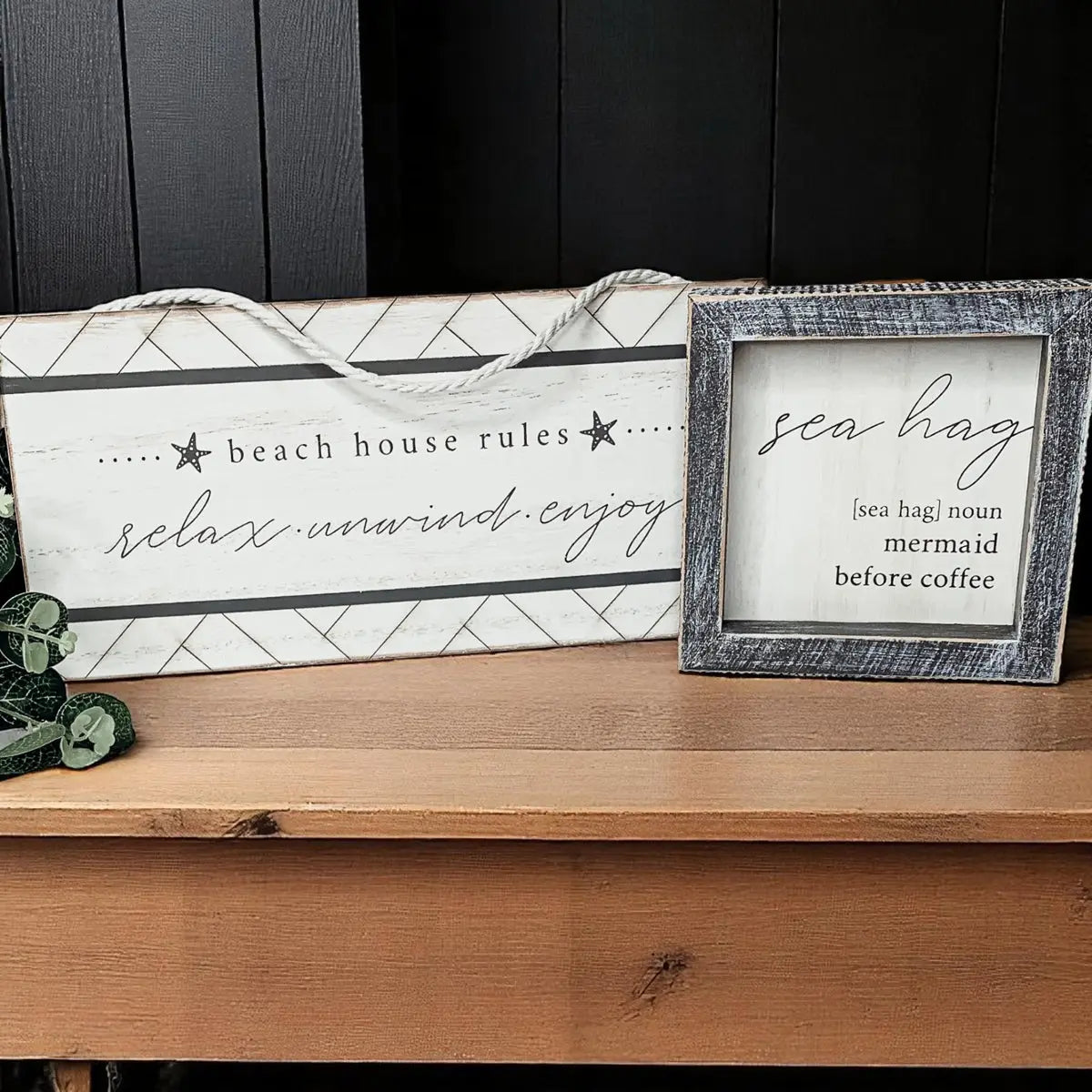 Beach house rules and sea hag decor signs on wooden shelf for cozy cottage style home