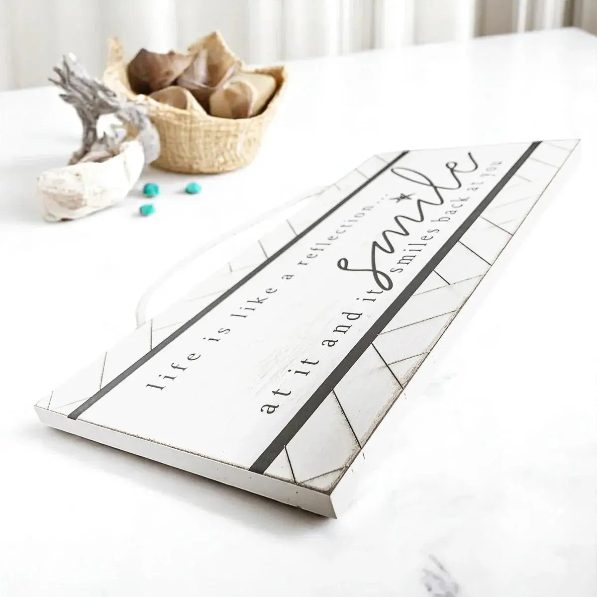Decorative book with inspirational quote on a white surface