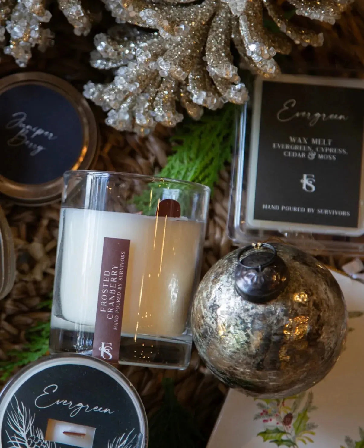 Frosted Cranberry candle, Evergreen wax melt, and holiday decor with glitter pinecones and mercury glass ornament